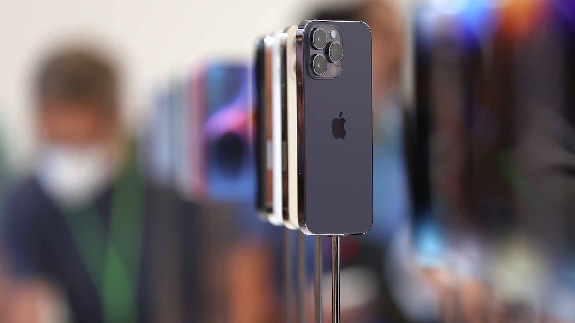 Image for the title: Apple unveils iPhone 14 with satellite messaging, Ultra Watch 