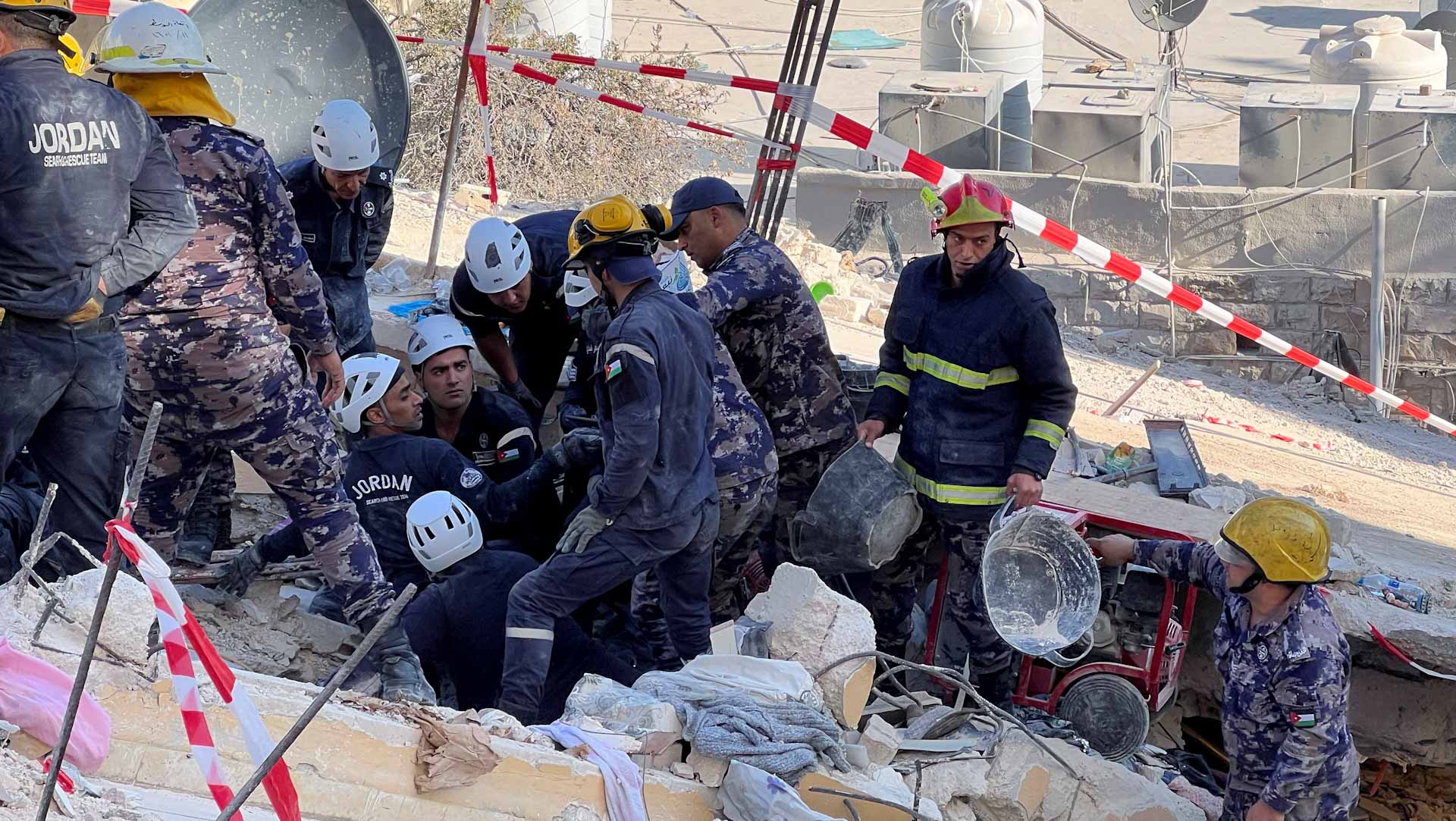 Image for the title: 13 dead in Jordan building collapse: new toll 
