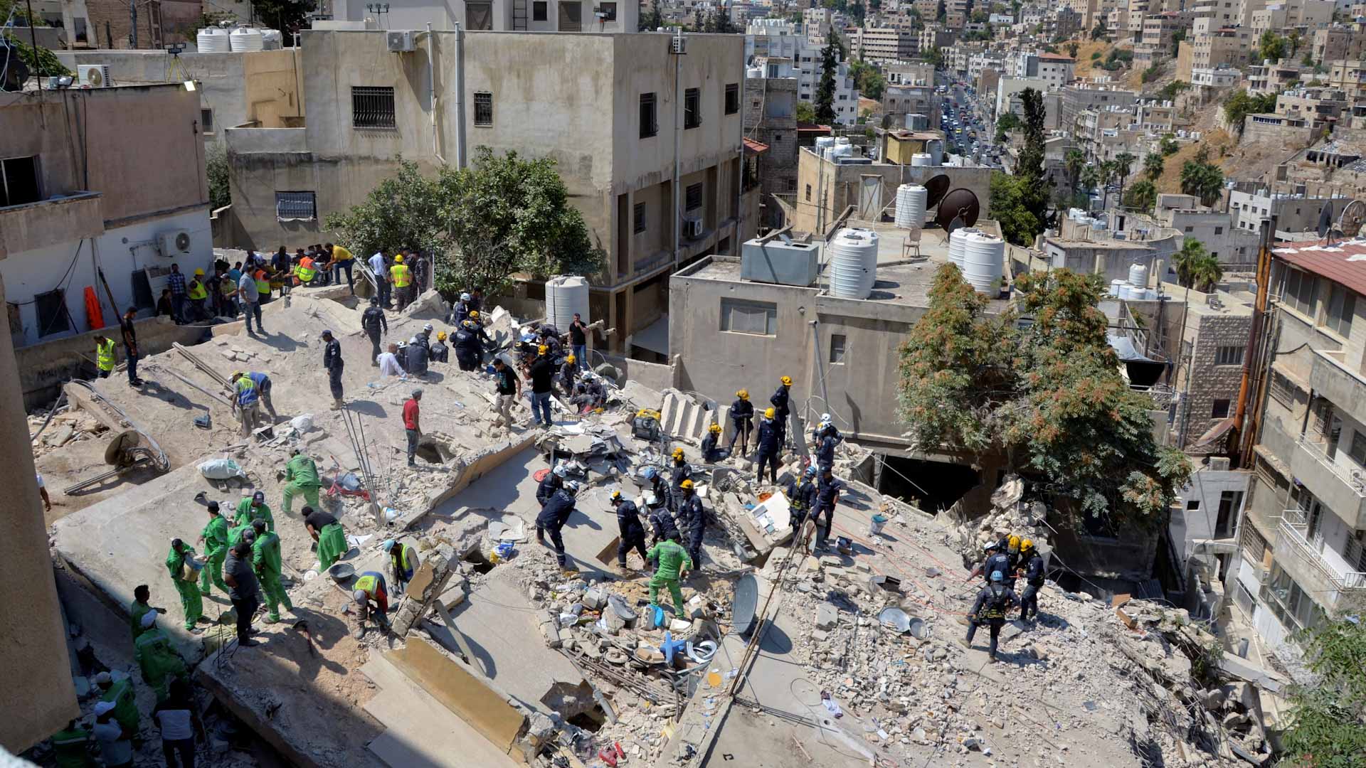 Image for the title: 14 dead in Jordan building collapse as search ends 