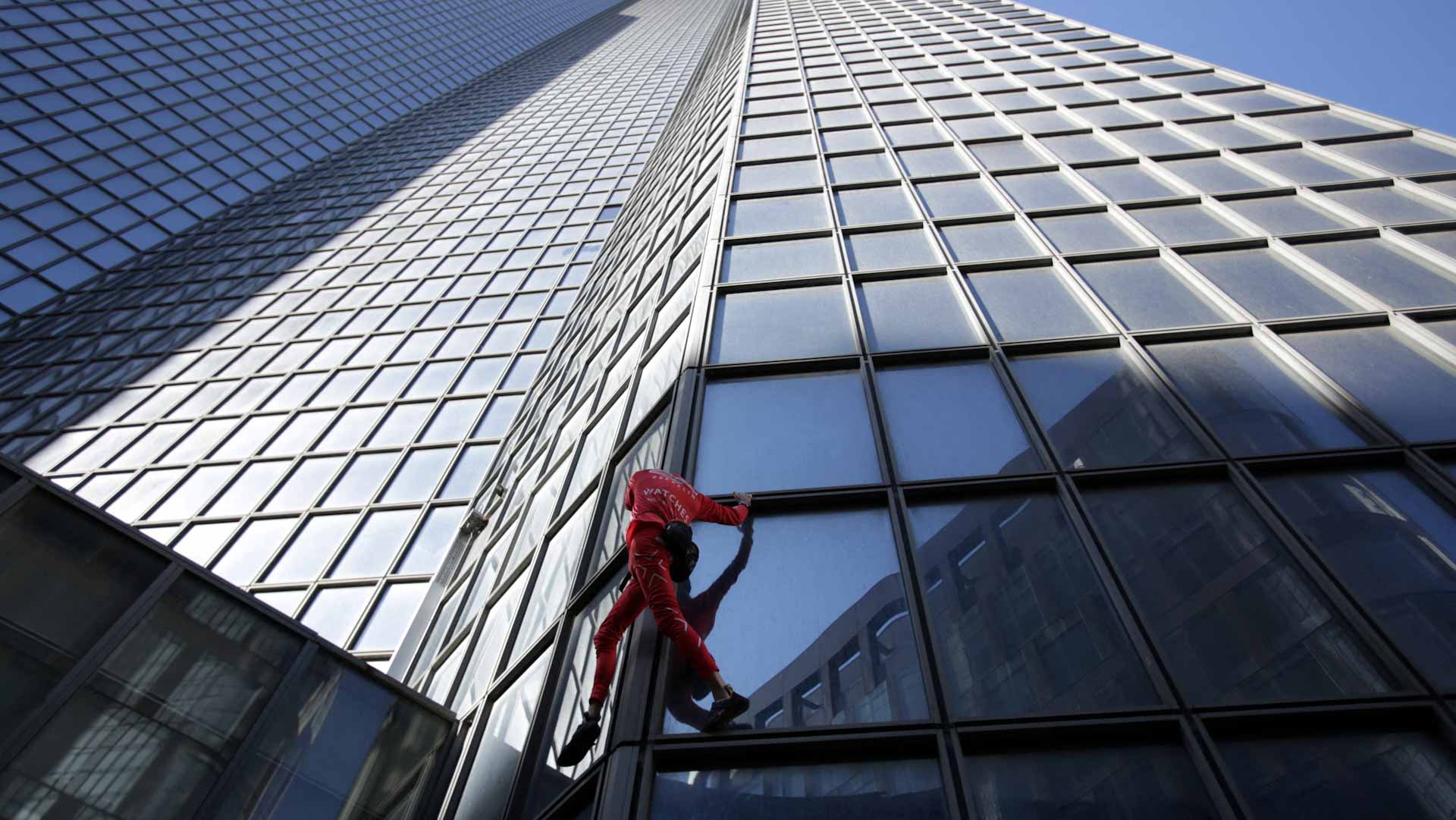 Image for the title: French 'Spiderman' scales tower to celebrate turning 60 