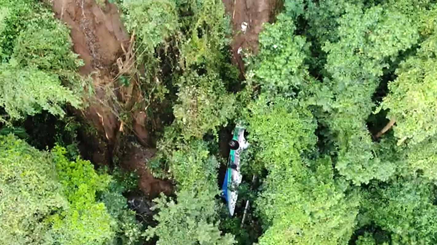 Image for the title: Bus plunges into Costa Rican ravine, killing at least nine 