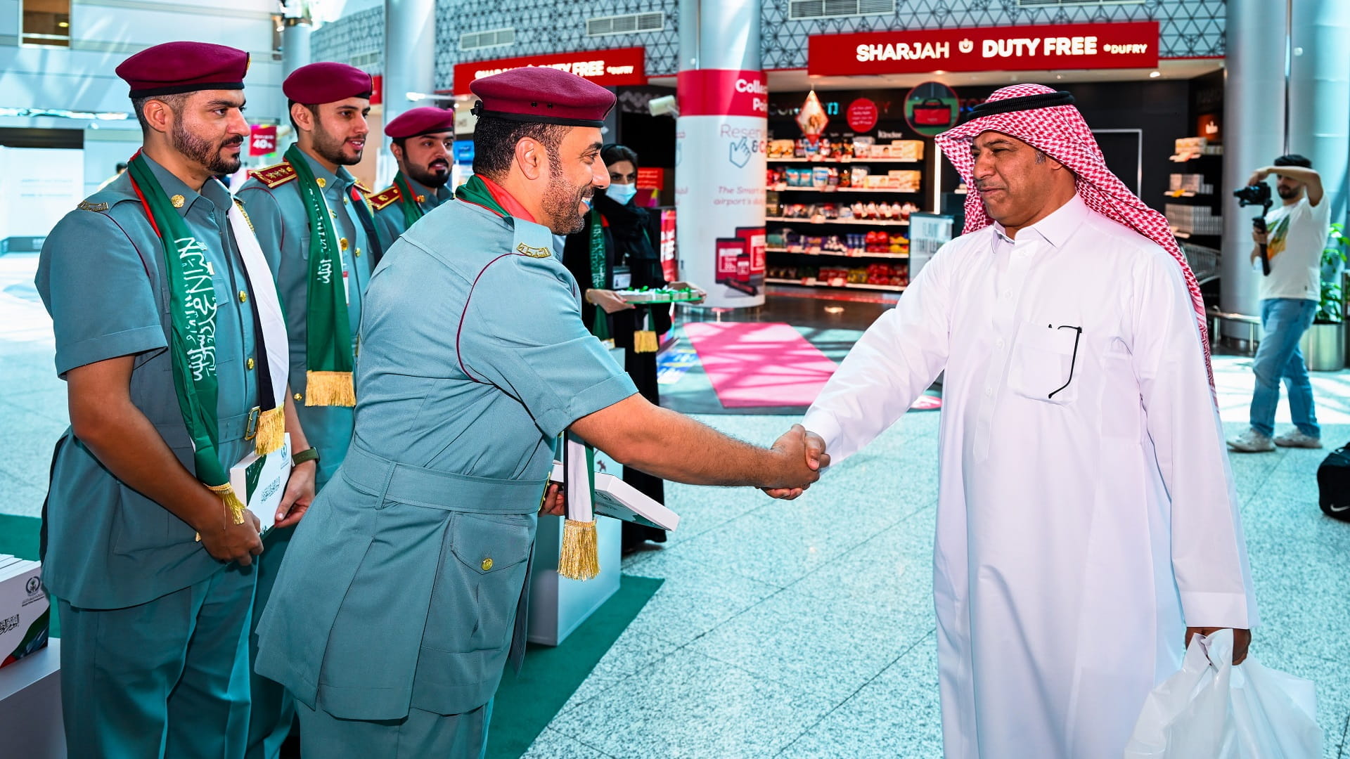 Image for the title: Sharjah Police marks KSA National Day with Saudi visitors 
