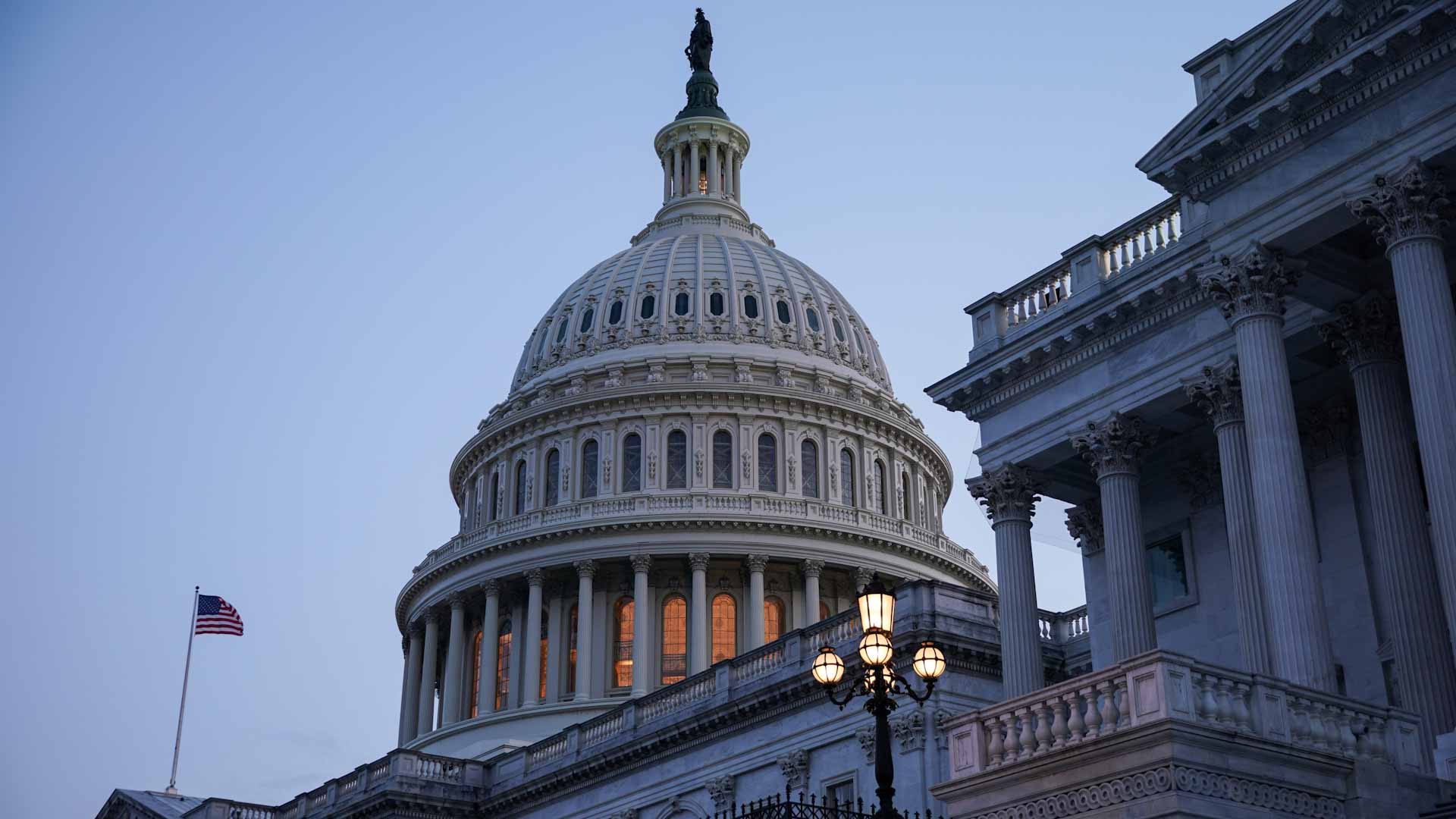 Image for the title: US Congress signs off on $12 bn for war-torn Ukraine 