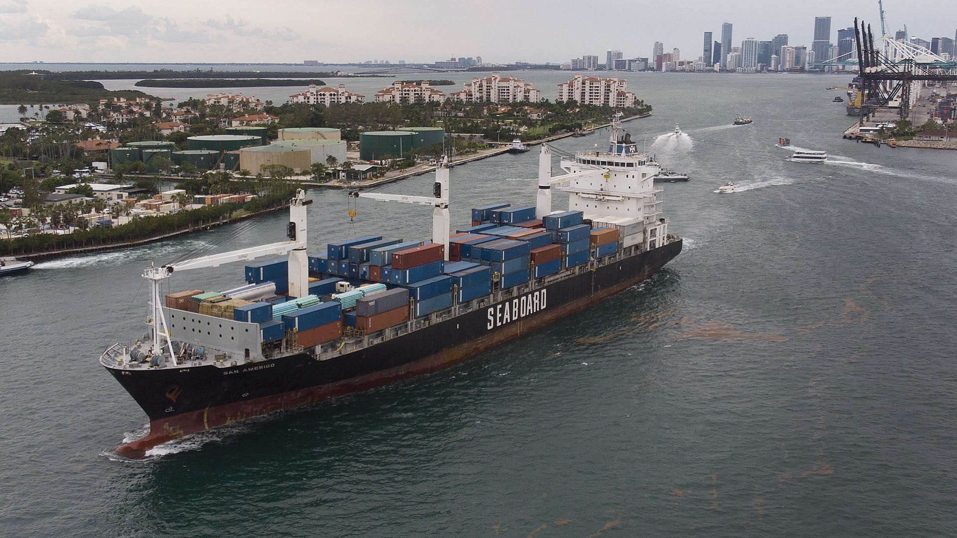 Image for the title: US trade gap expands slightly in February as exports slip 