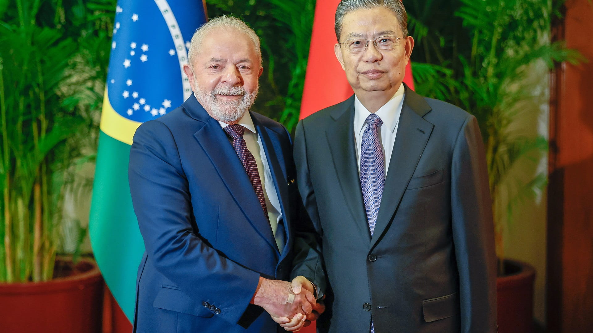 Image for the title: Lula to meet Xi in Beijing after lashing out at US dollar, IMF 