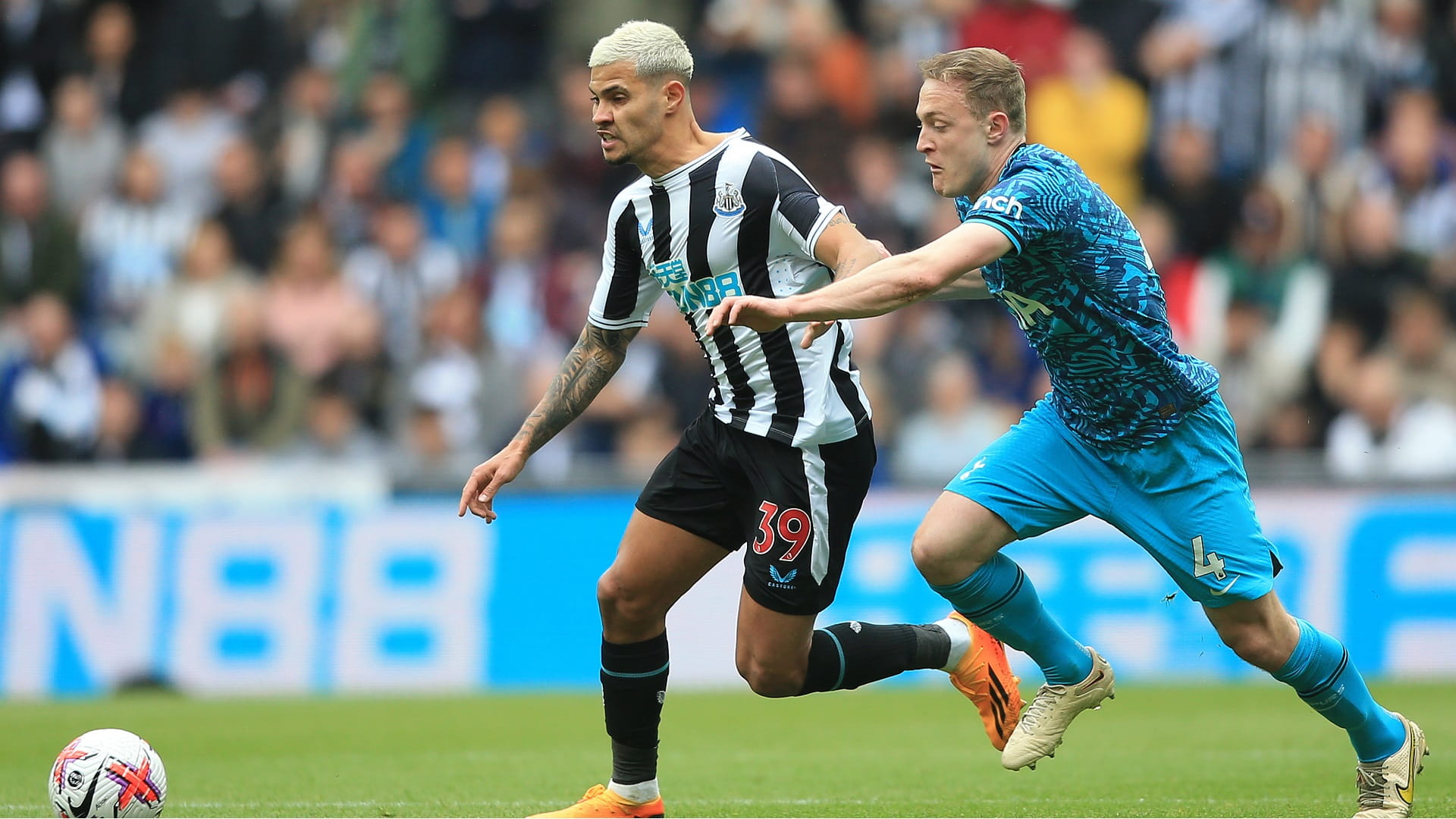 Image for the title: Rampant Newcastle hit Tottenham for six to go third 