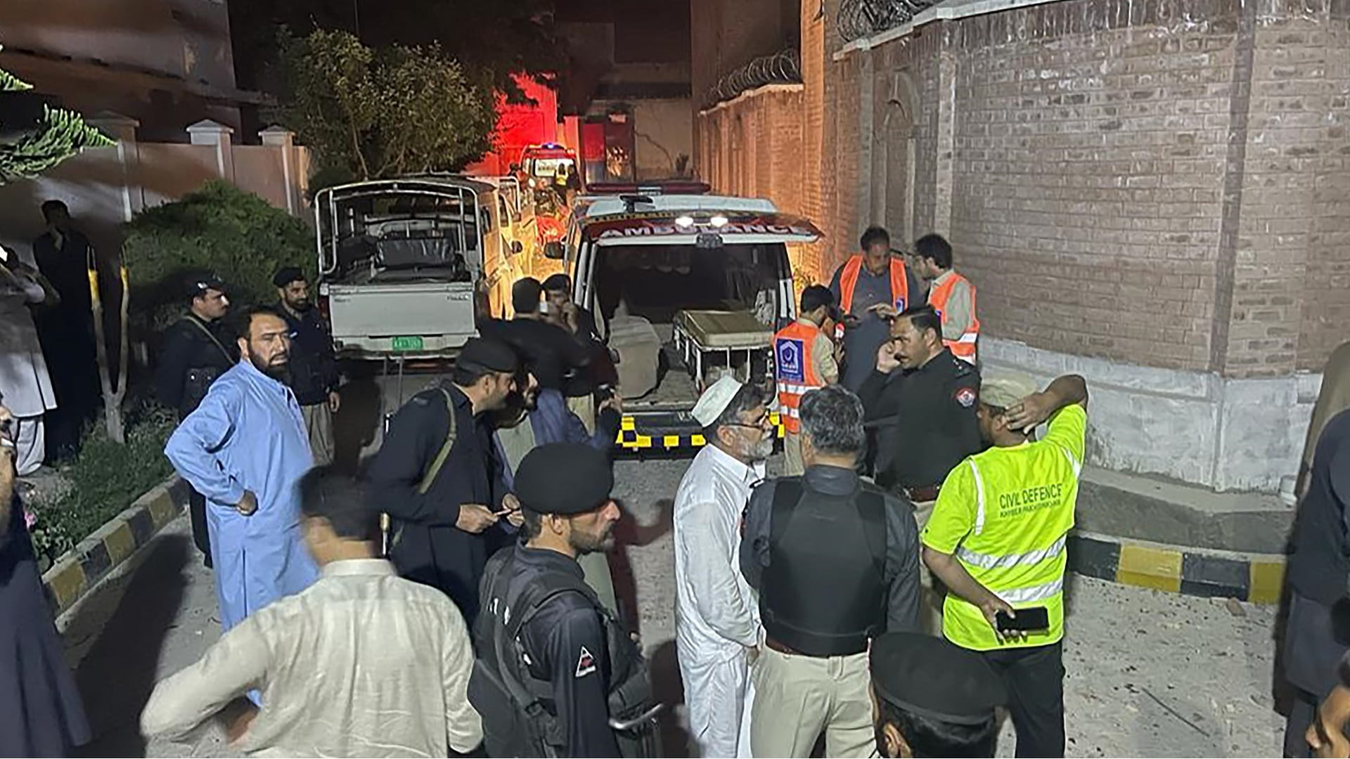 Image for the title: Blasts inside Pakistan police station kill 7, wound 44 
