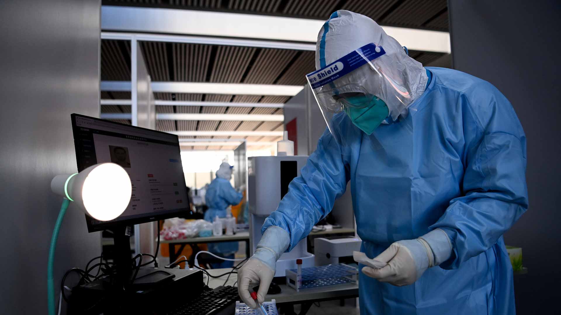 Image for the title: China to replace PCR test requirement with antigen test 