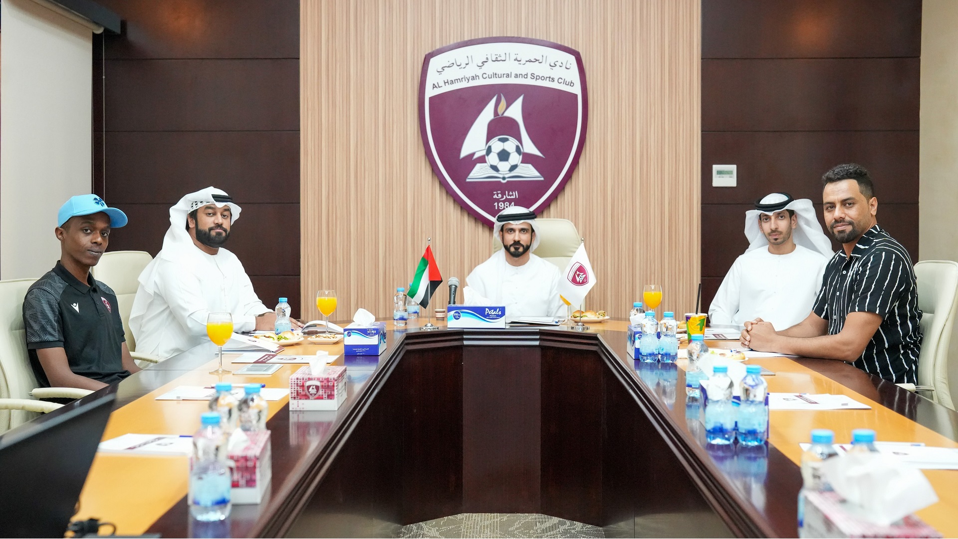 Image for the title: SSC meets with Al Hamriyah Club's Media Committee 