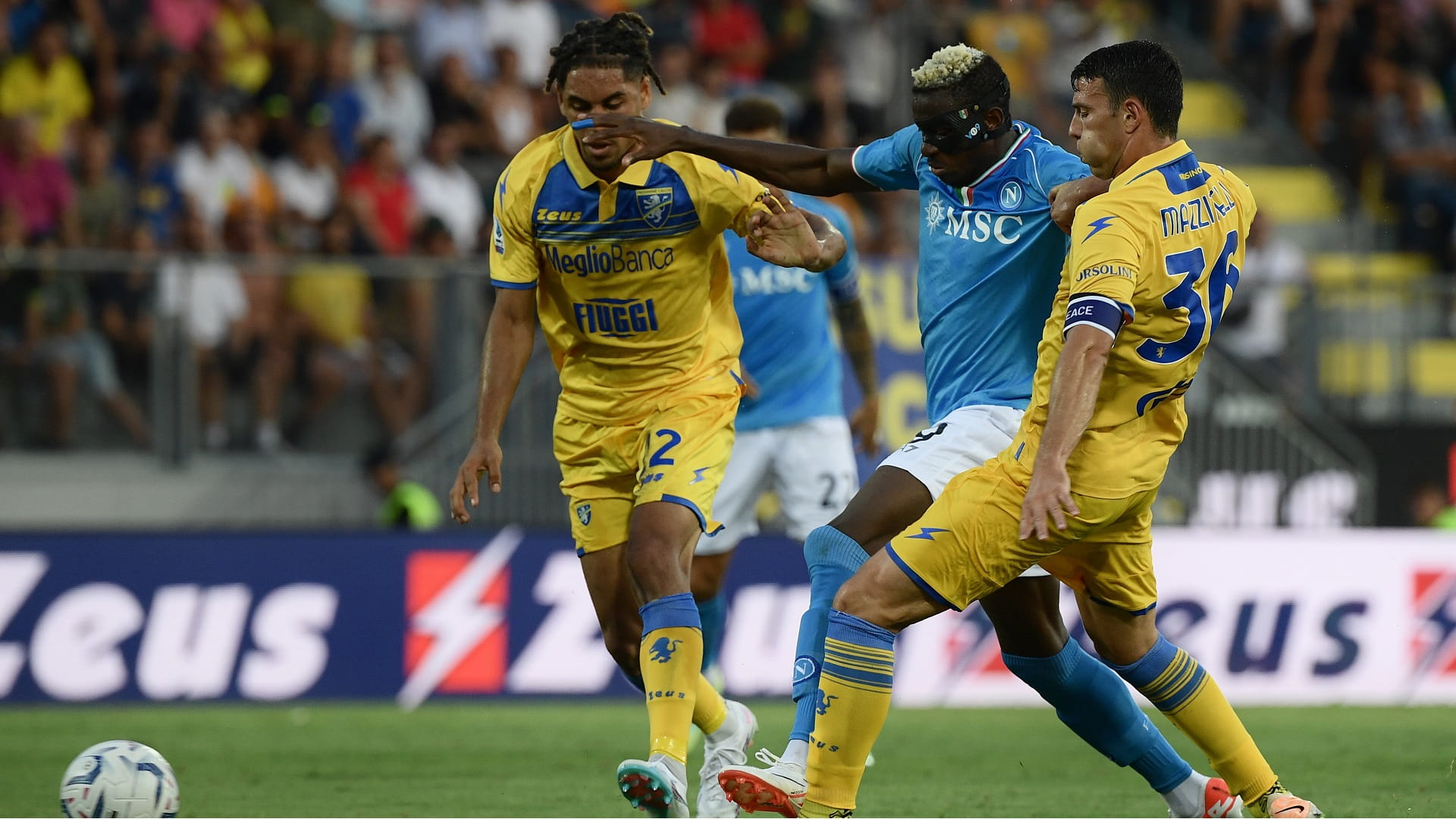 Image for the title: Osimhen hits double in Napoli's winning start to title defence 
