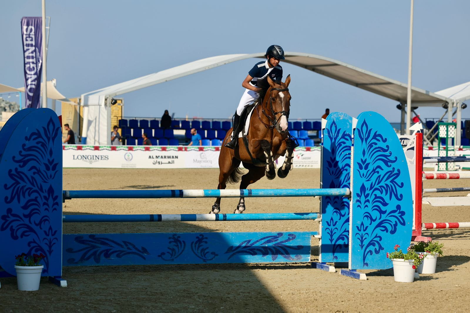 Image for the title: 156 riders inaugurate jumping championship at Kalba Beach 