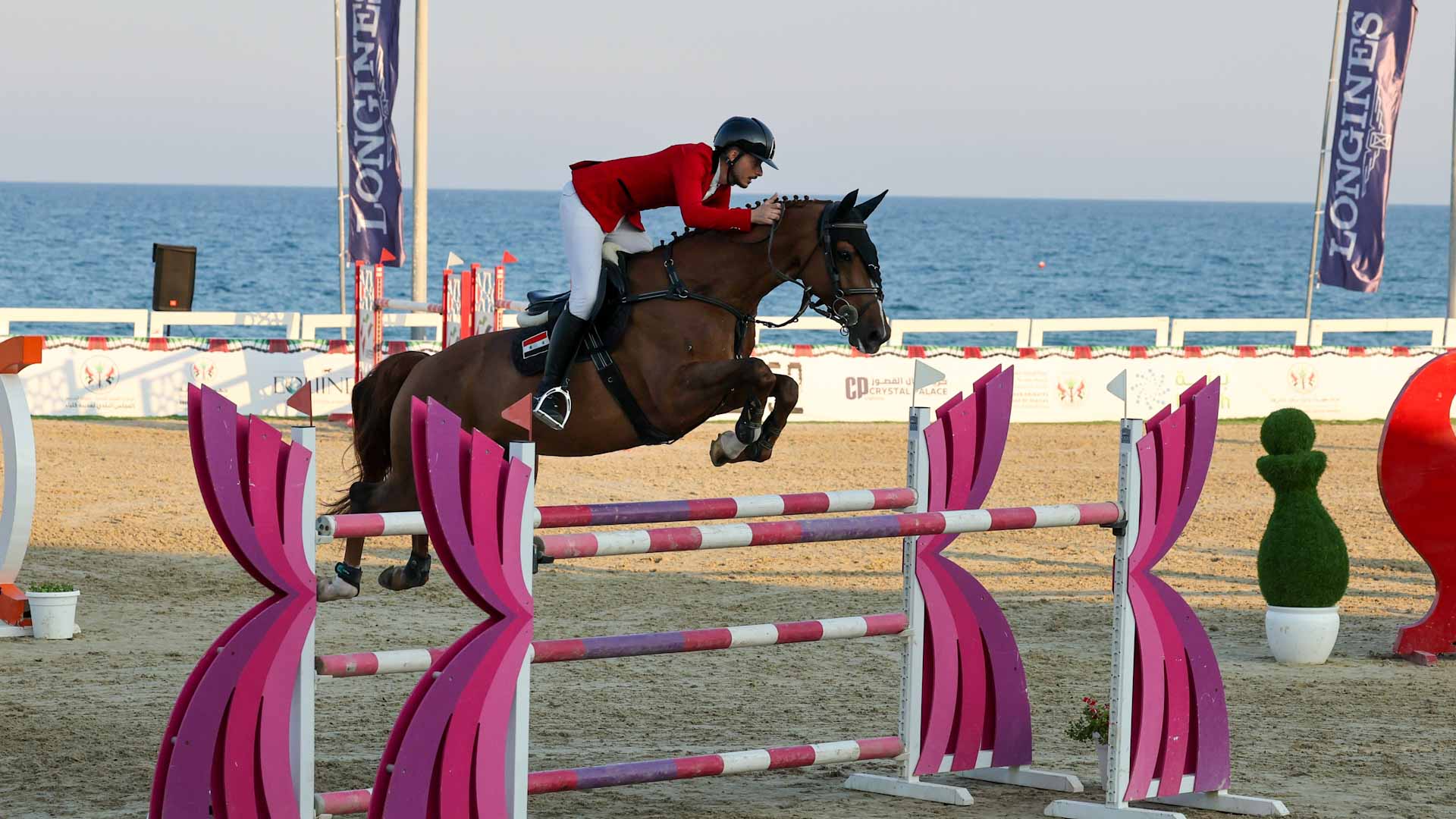 Image for the title: Kalba Int’l Hurdles Championship: Equine Thrills Unleashed 