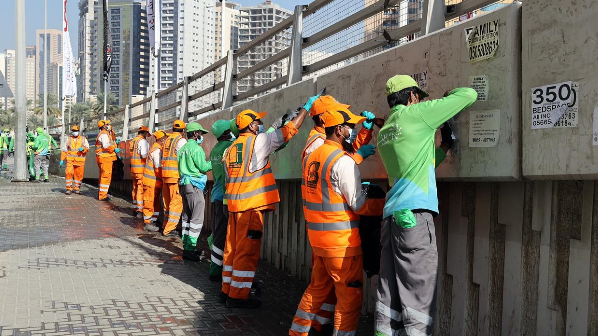 Image for the title: Sharjah Municipality removes random posters from city’s roads 