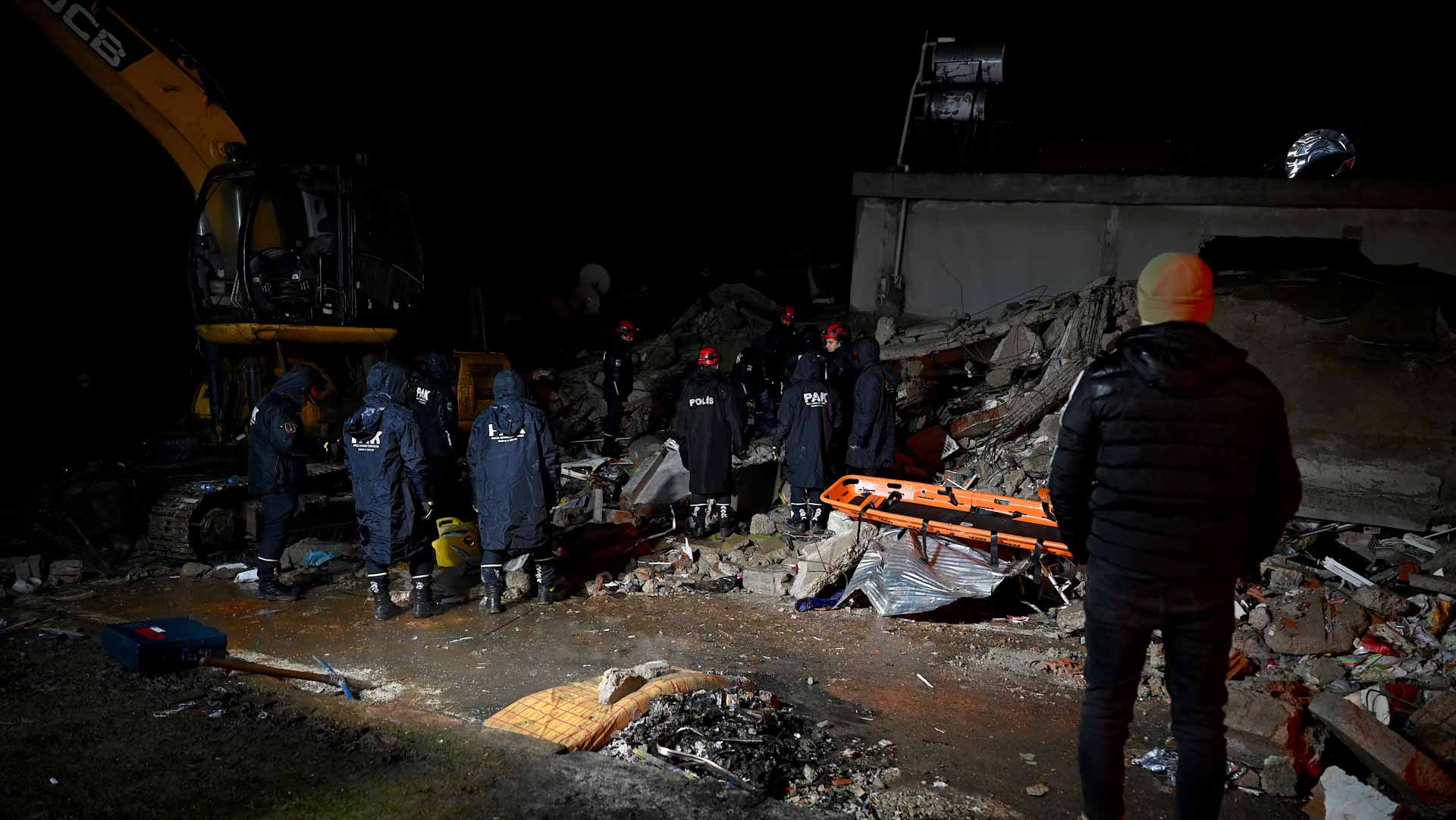 Image for the title: Syria says quake aid will reach all its people 