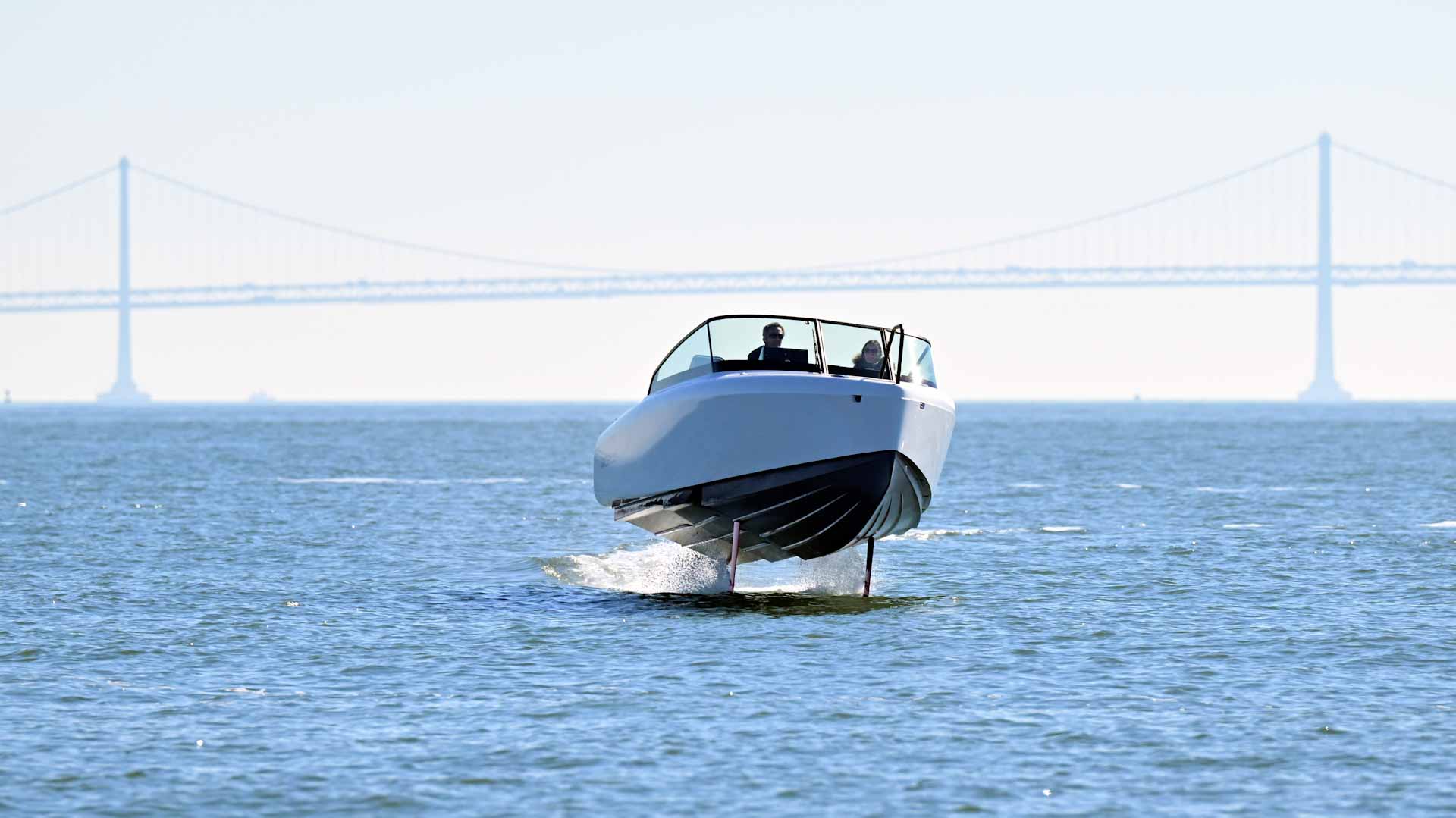 Image for the title: Electric boat goes airborne for cleaner ocean voyage 