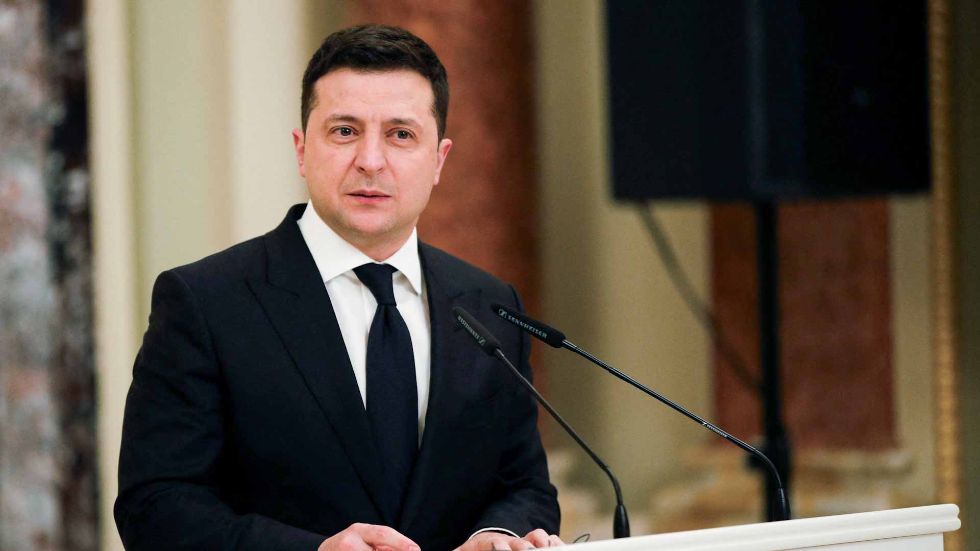 Image for the title: Zelenskiy says Macron wasting time in seeing dialogue with Russia 