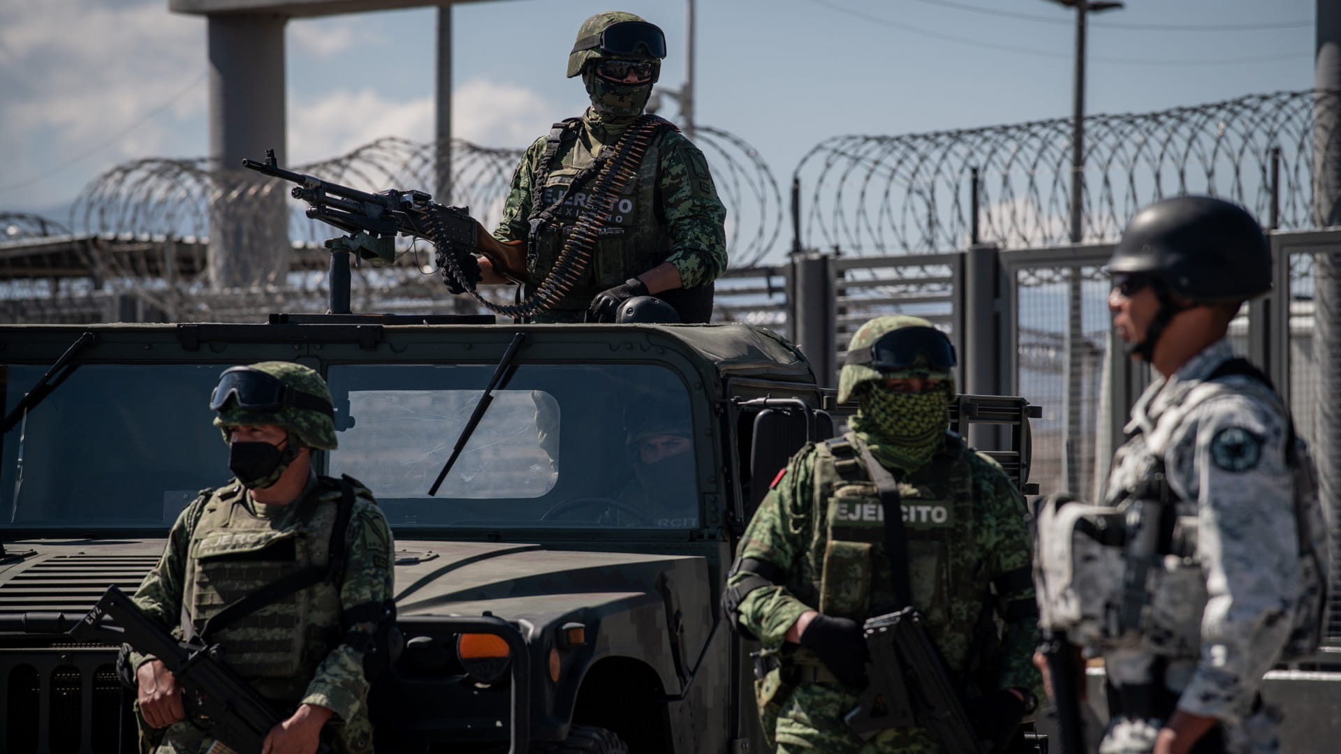 Image for the title: 29 killed in arrest of Mexico drug kingpin's son 