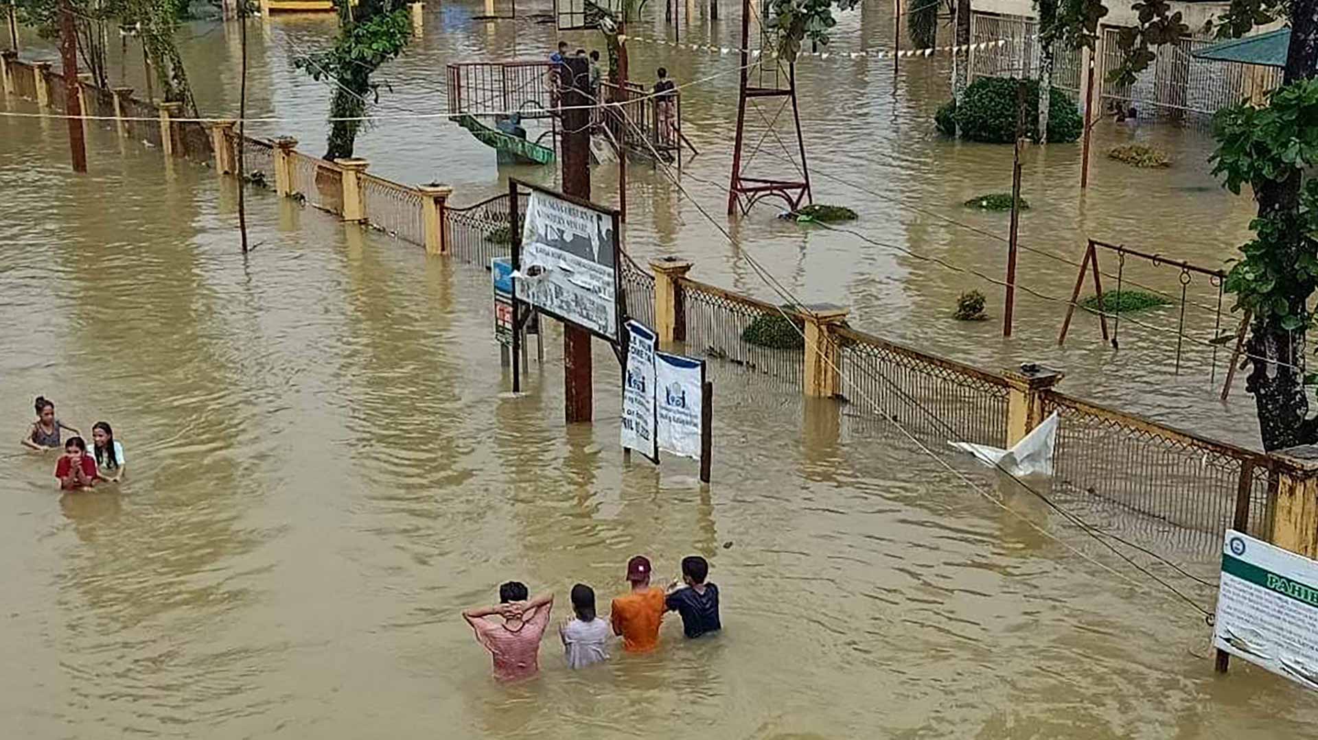 Image for the title: Death toll in Philippine storms rises to 27 