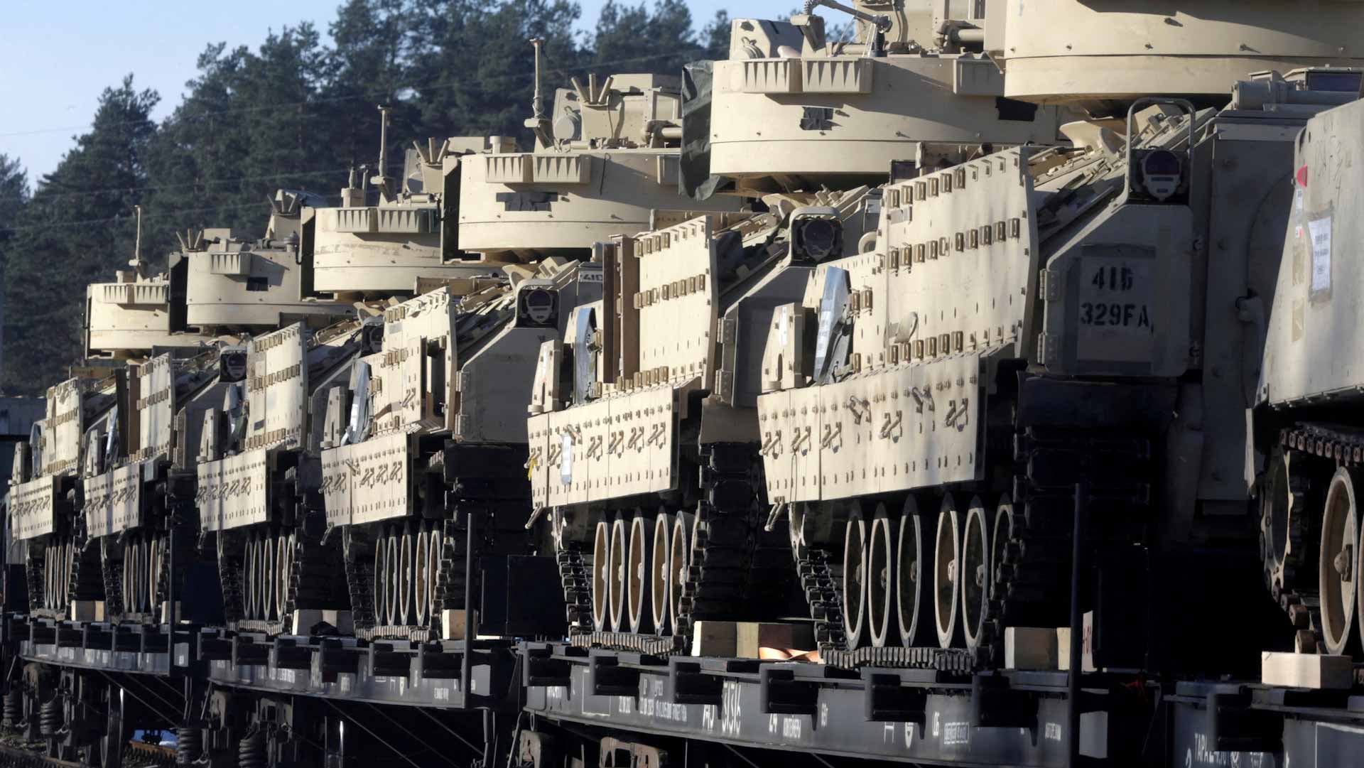 Image for the title: U.S. to send hundreds of armored vehicles, rockets to Ukraine 