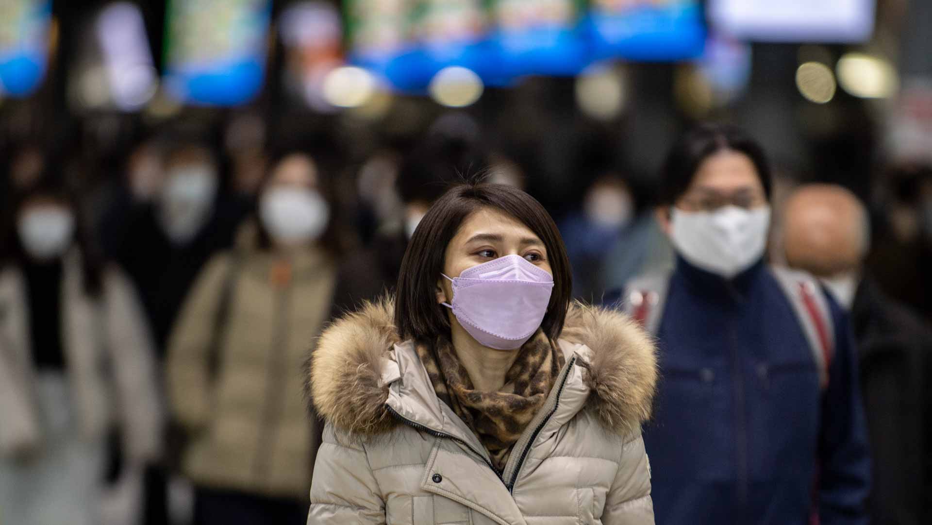 Image for the title: Japan to consider downgrading COVID-19 to less serious category 