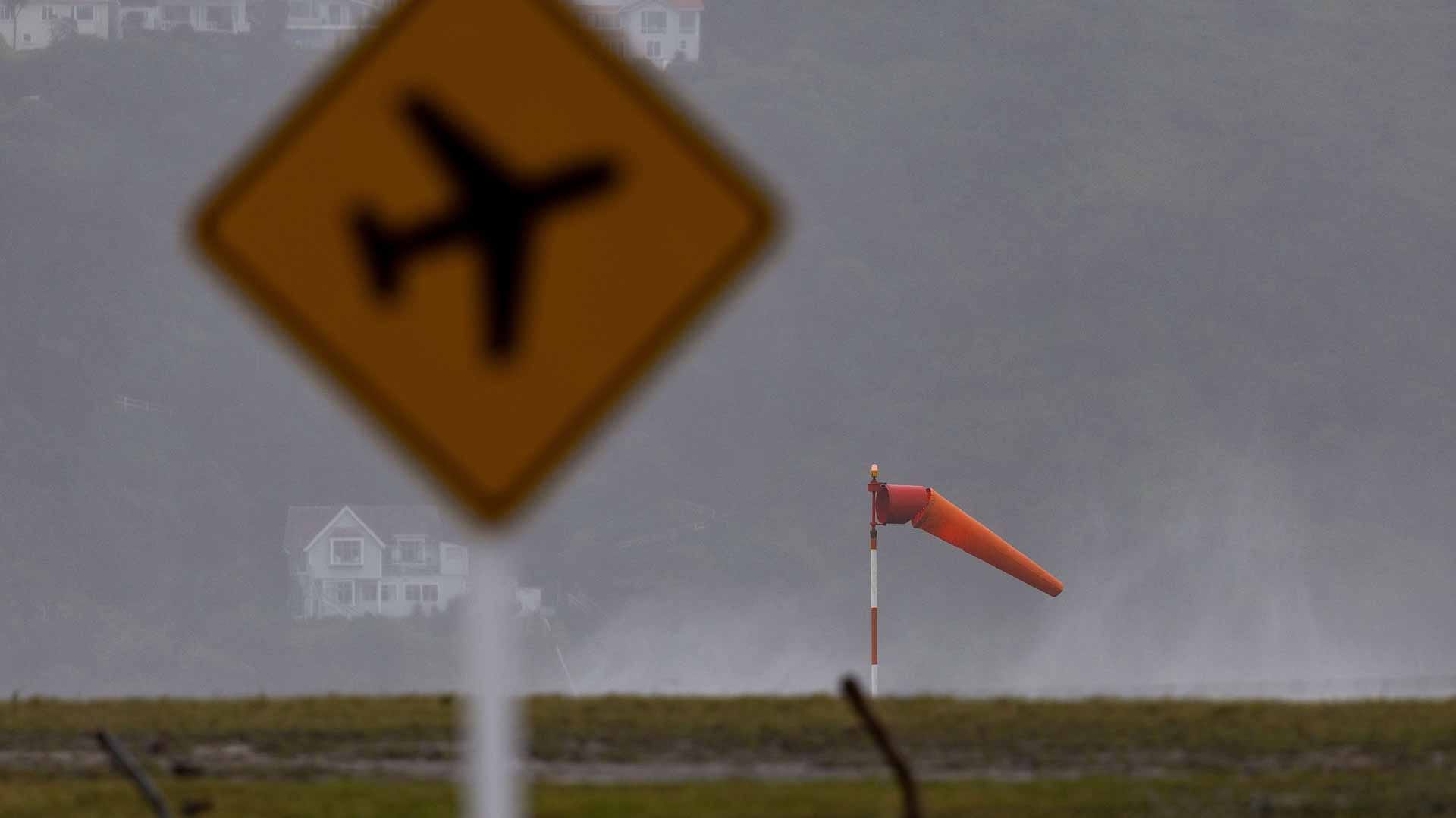 Image for the title: Three dead, one missing after record rain in New Zealand 
