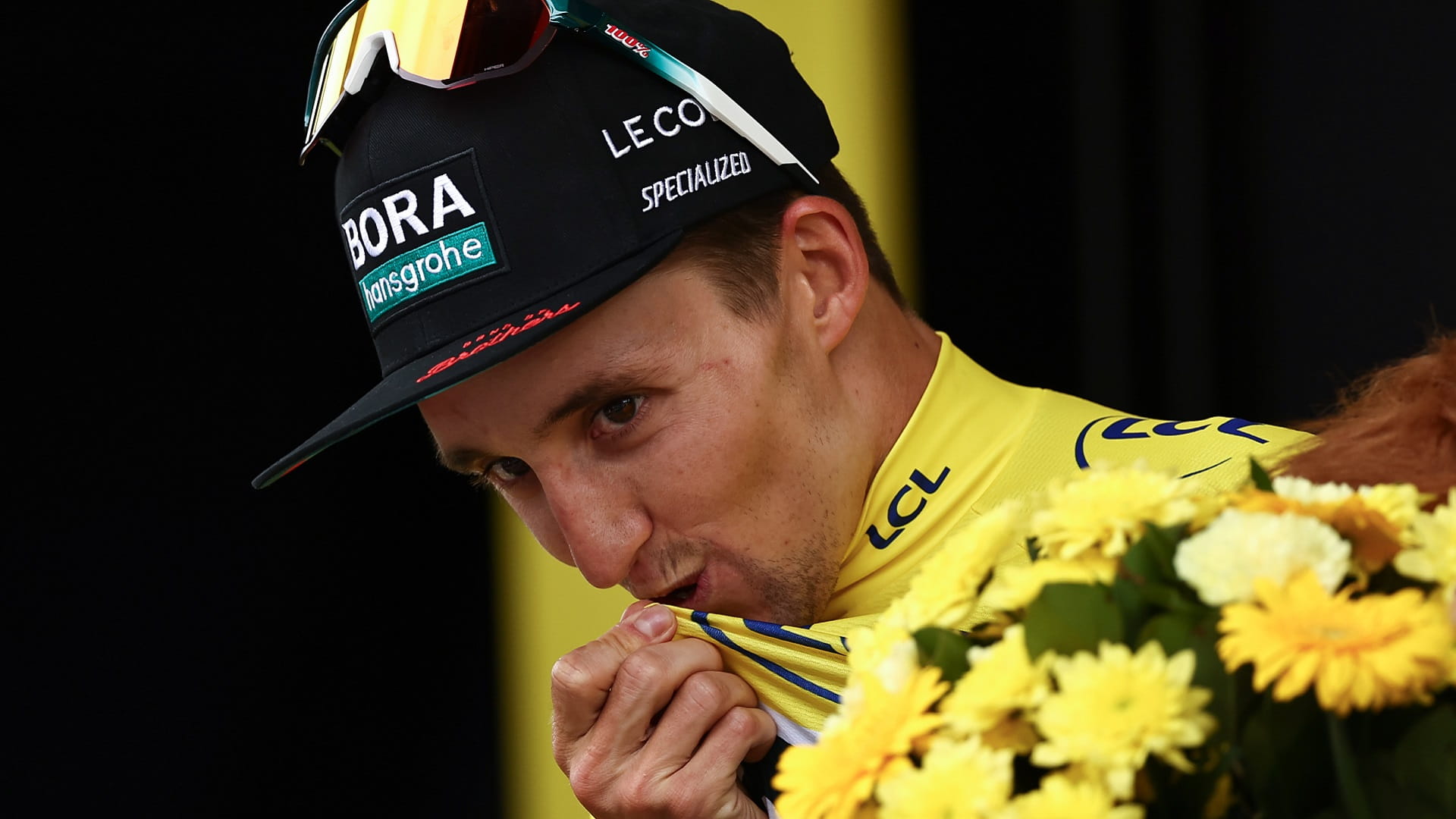 Image for the title: Hindley takes Tour de France lead as Pogacar suffers in Pyrenees 