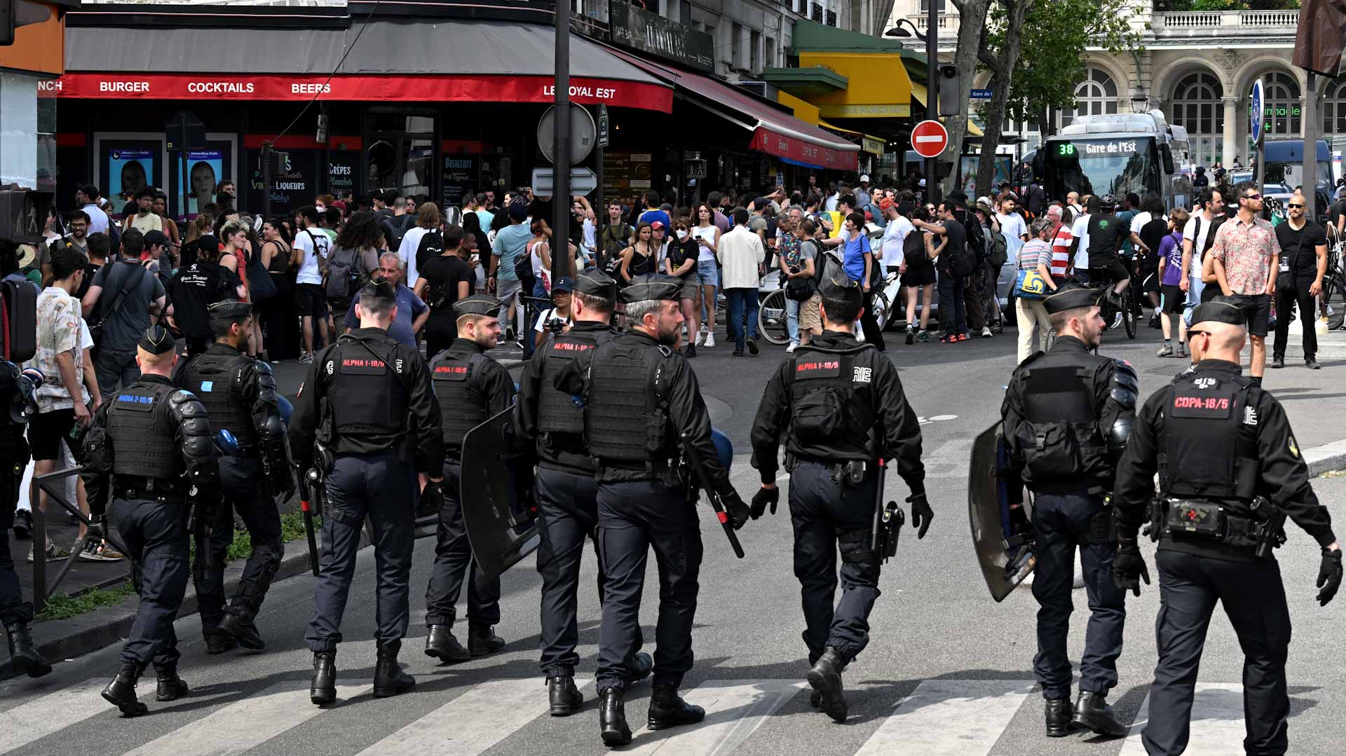 Image for the title: France protesters defy bans to rally against police violence 