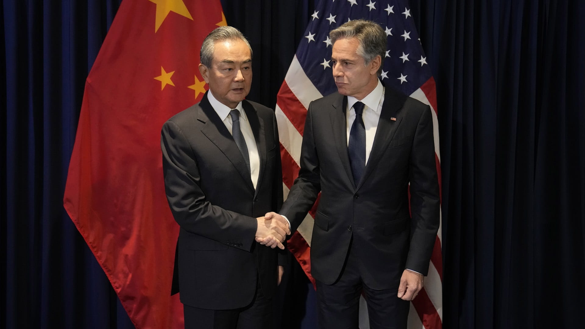 Image for the title: Wang tells Blinken to 'work with China' on improving US ties 