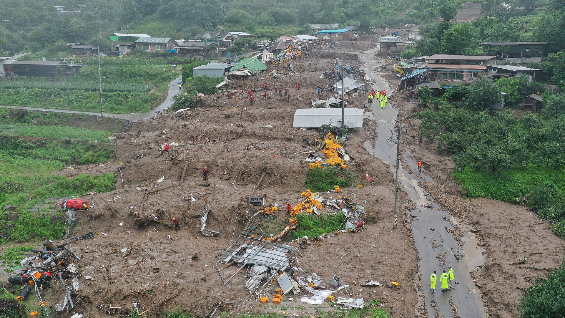 Image for the title: Flooding leave 22 dead in South Korea