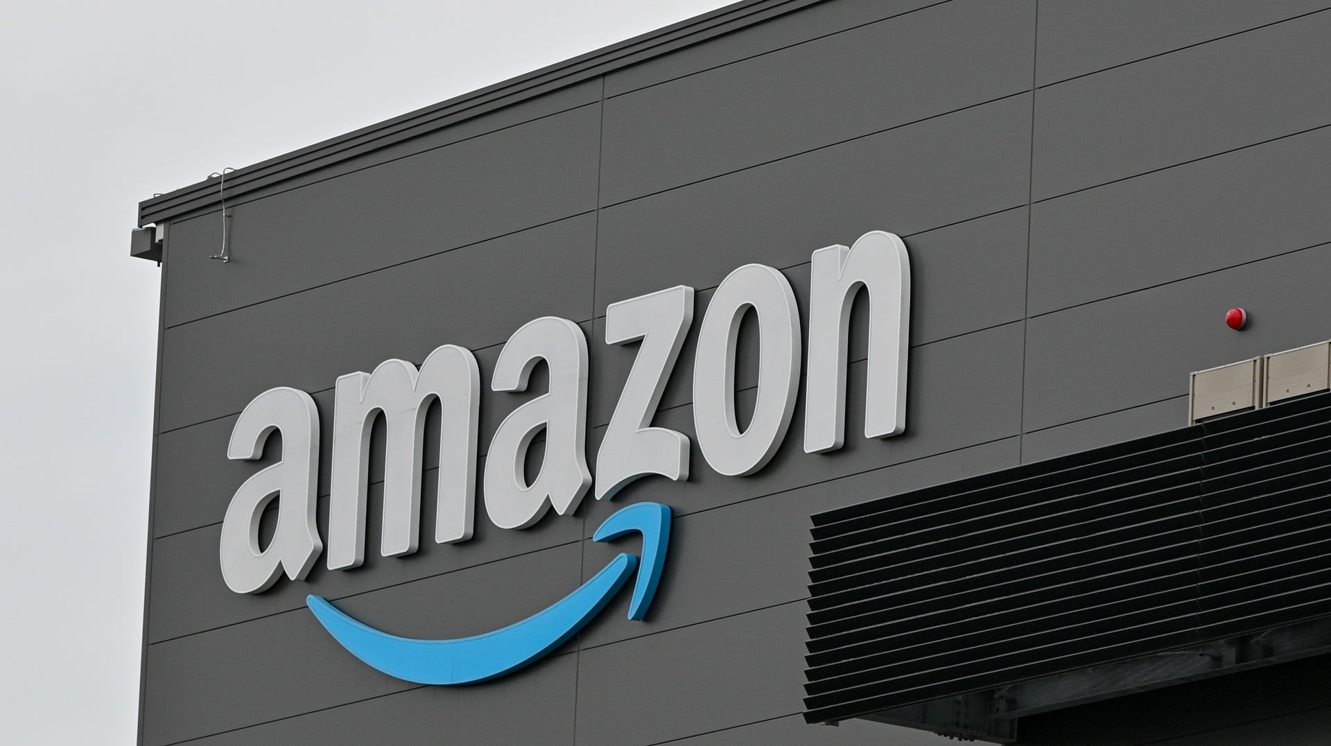 Image for the title: Amazon invests $120 million in internet satellite facility 