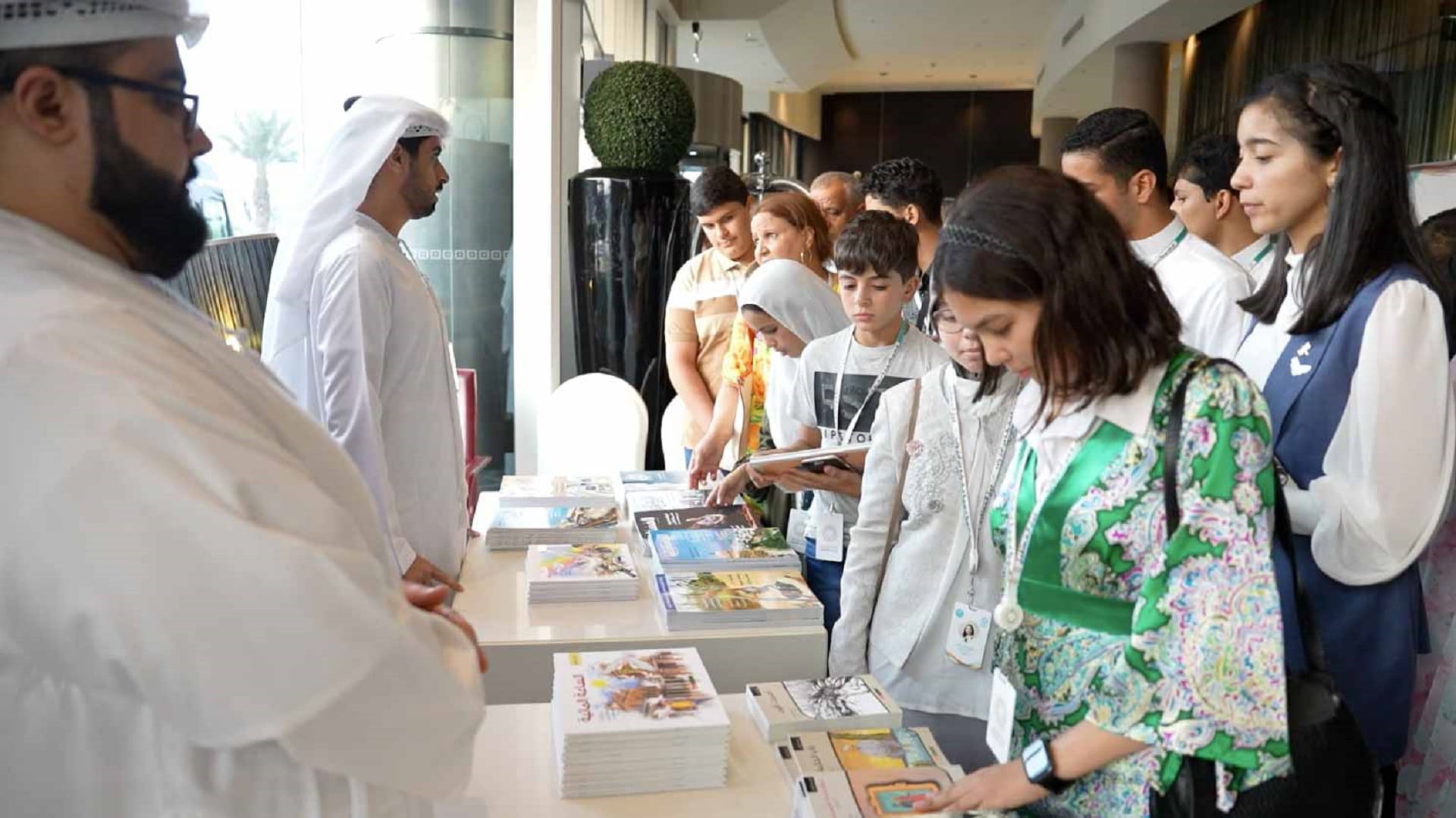 Image for the title: Department of Culture presents its publications to APC children 