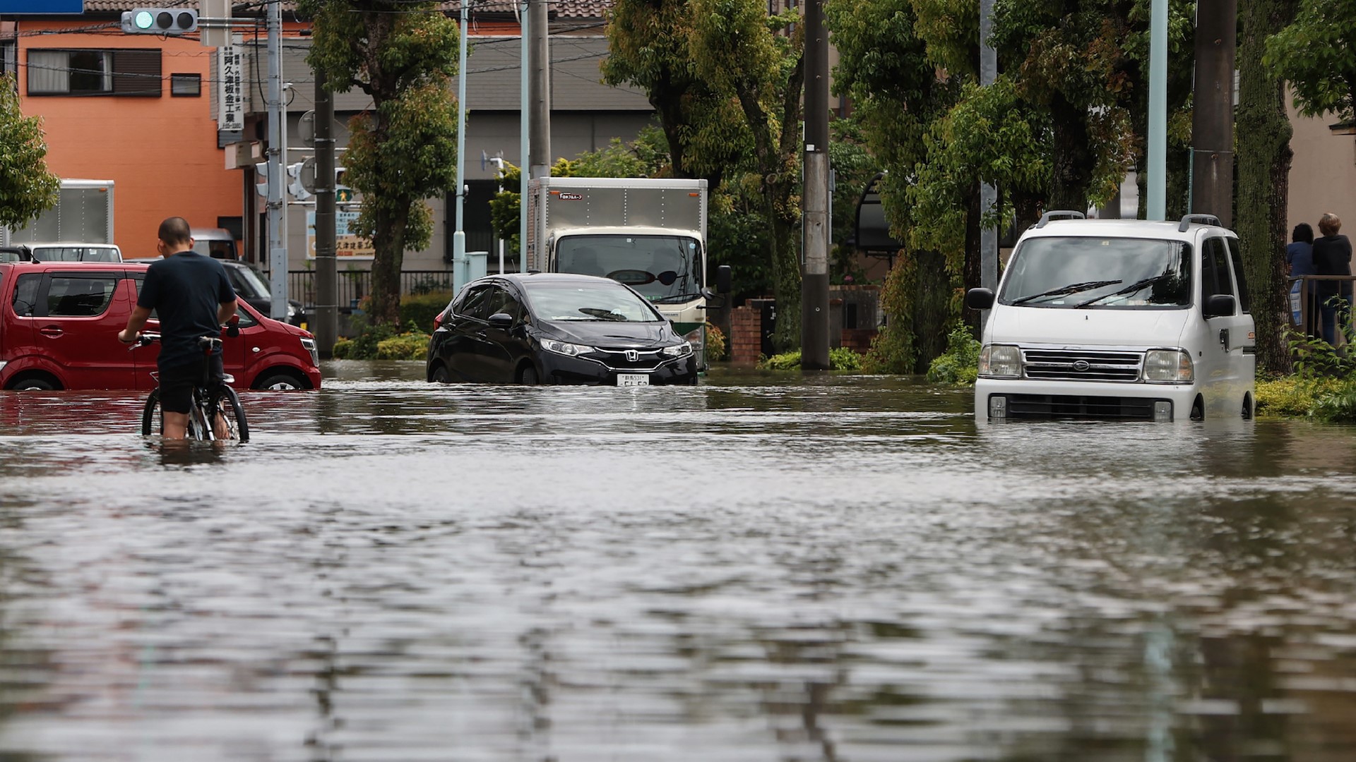 Image for the title: One dead, three missing in Japan after heavy rain 