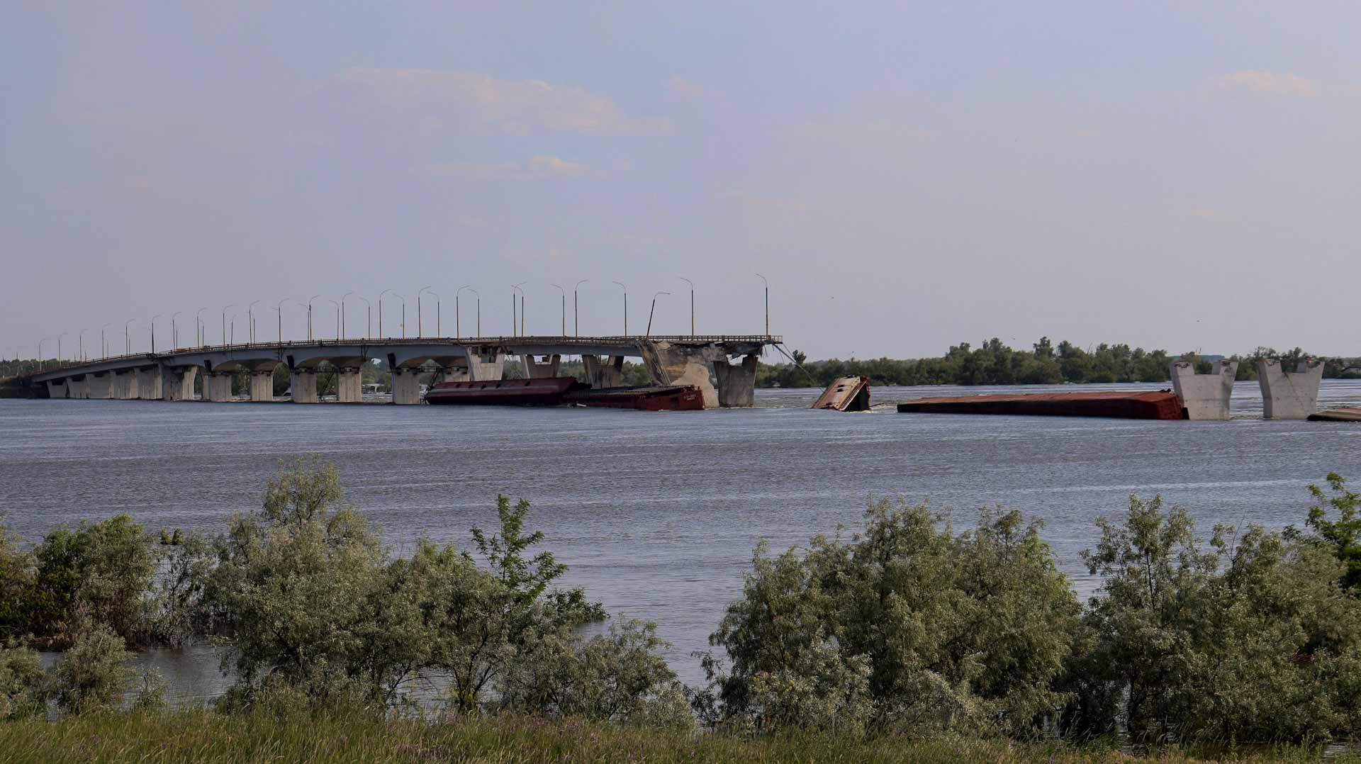 Image for the title: Ukraine says 5 killed in flooding after dam destroyed 