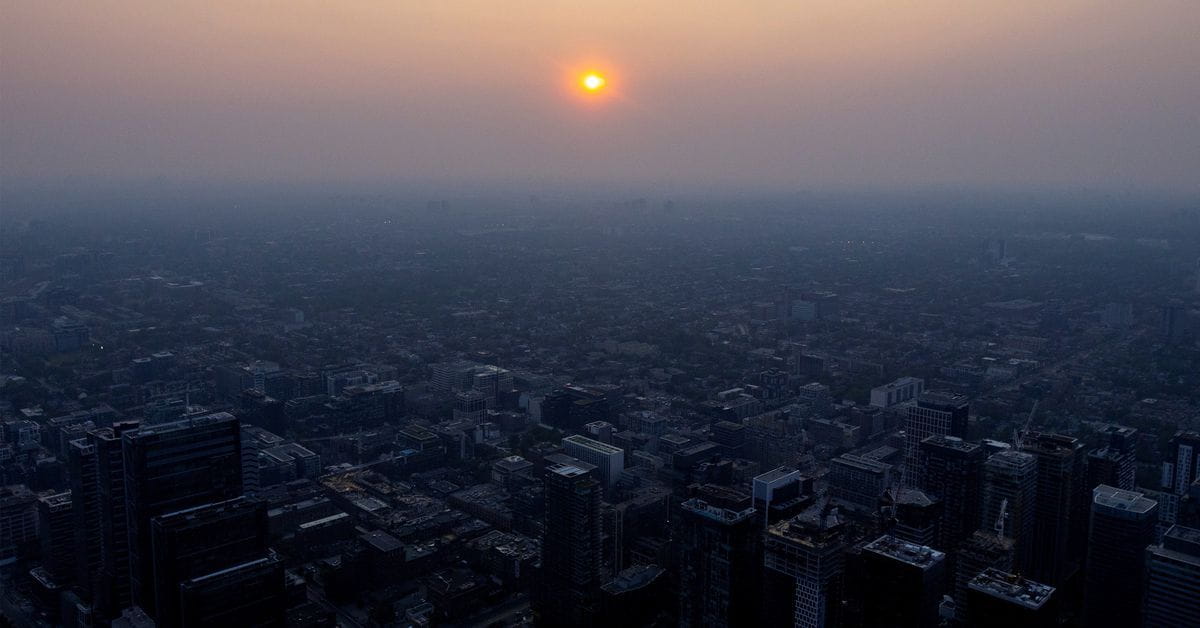 Image for the title: Quebec hopes rain, outside help can be turning point 
