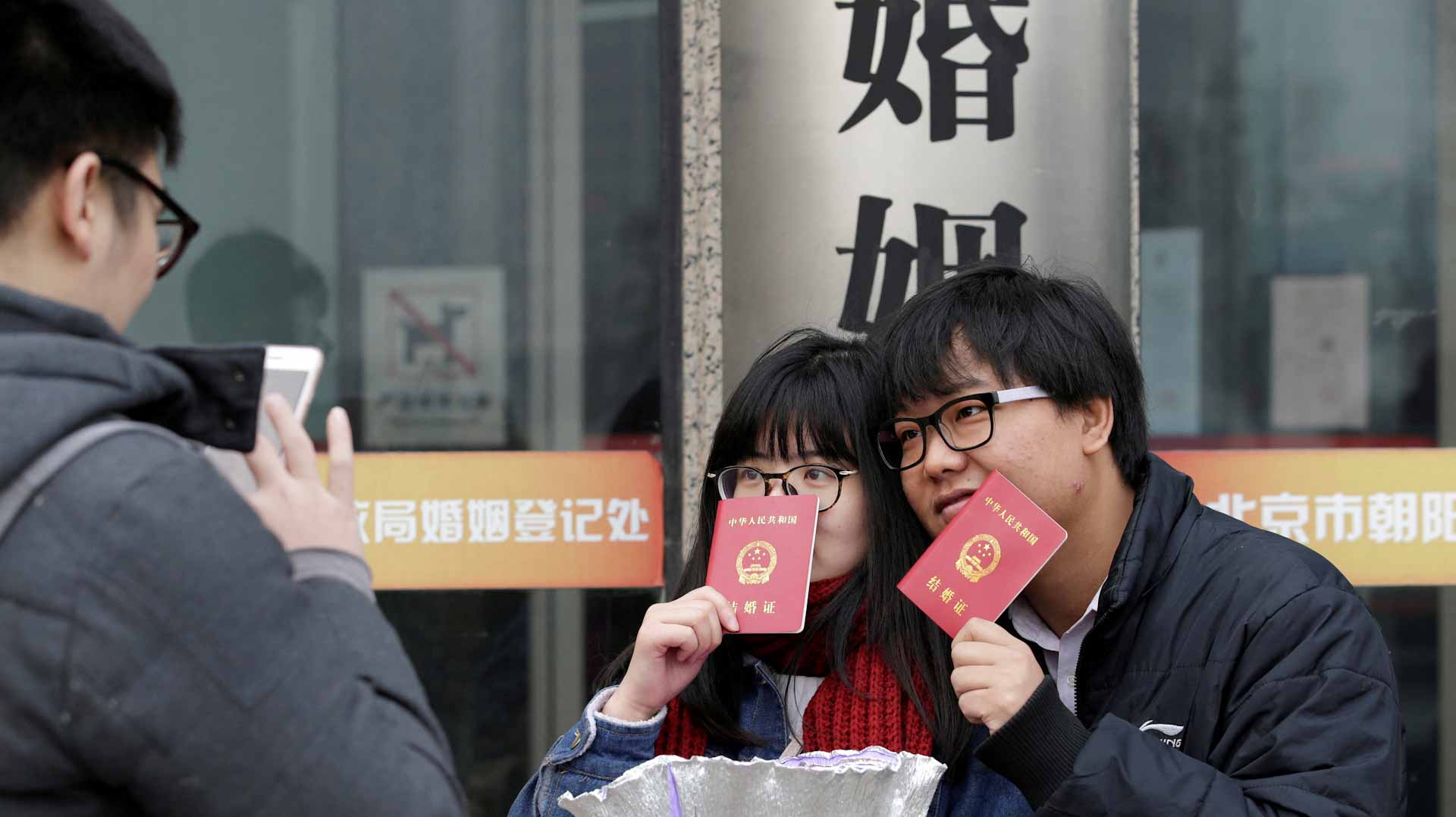 Image for the title: Marriages in China slump to historic low 