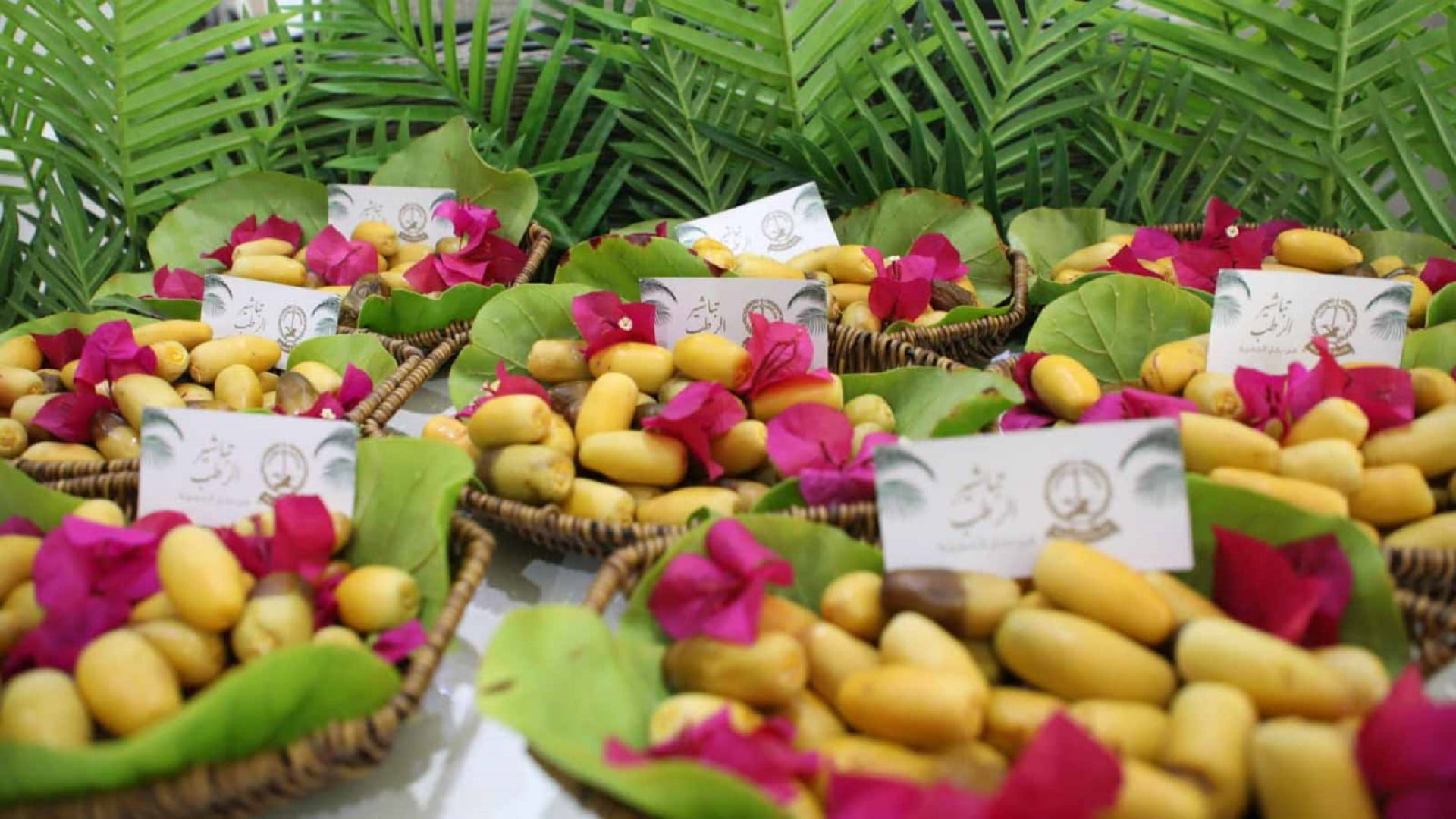 Image for the title: Al Hamriyah Municipality distributes dates to community members 