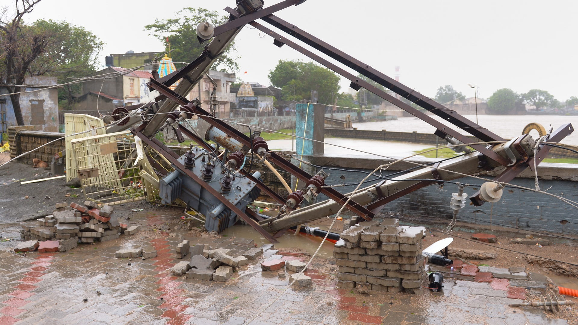 Image for the title: Cyclone Biparjoy leaves destructive trail on Indian coast 