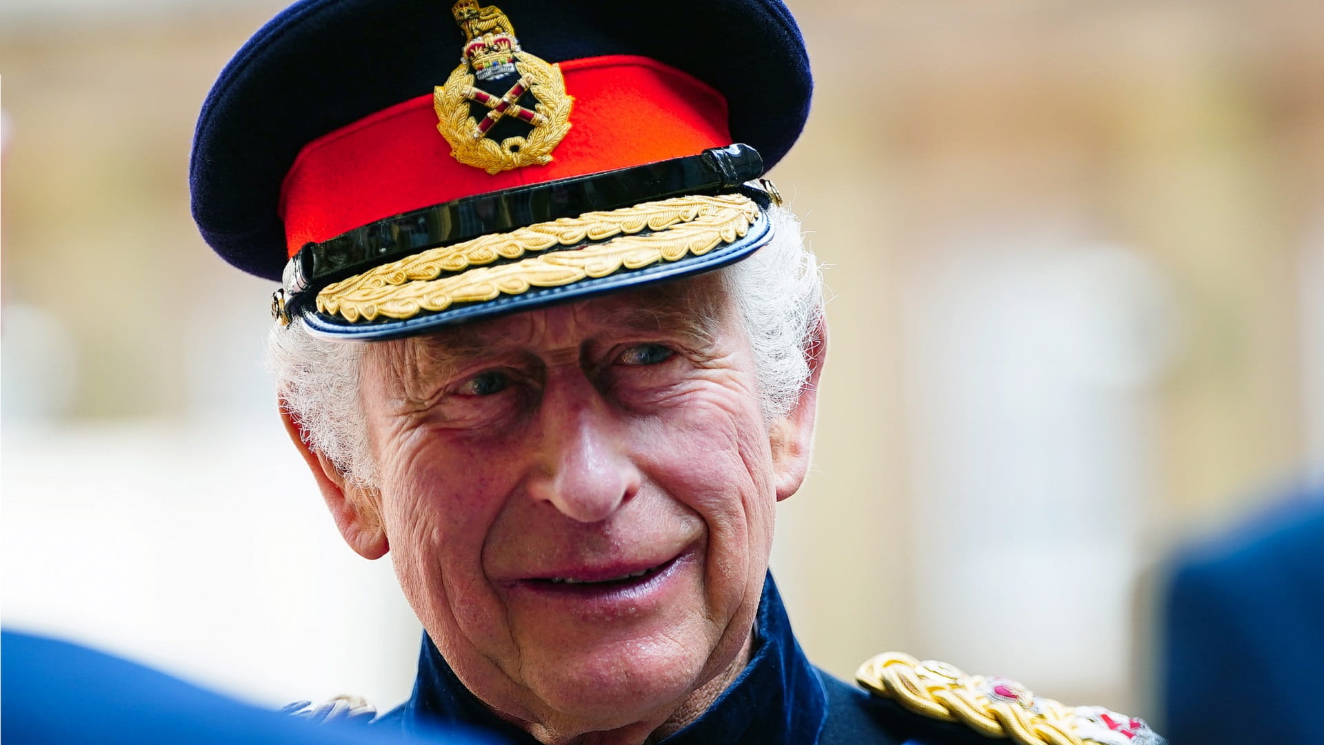 Image for the title: King Charles III saddles up for birthday parade 
