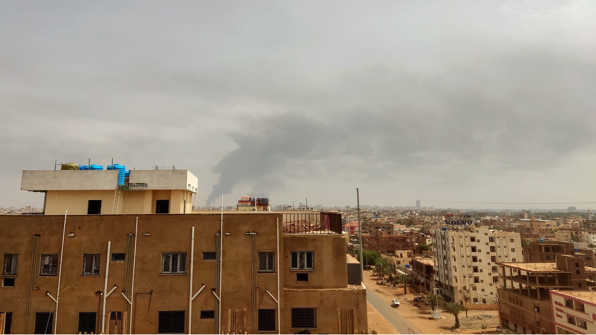 Image for the title: Clashes heard in Sudan's capital as Eid holiday begins 