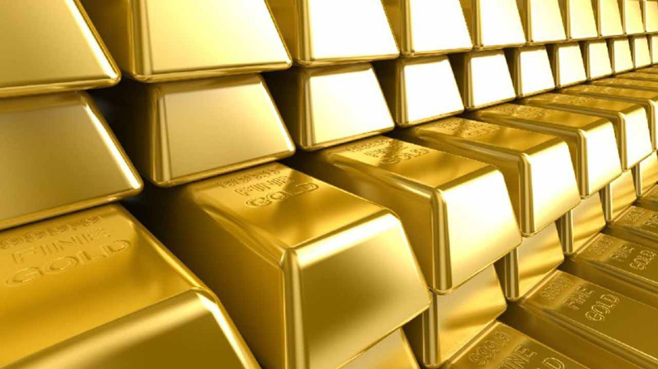 Image for the title: Gold slides to over 3-month low 