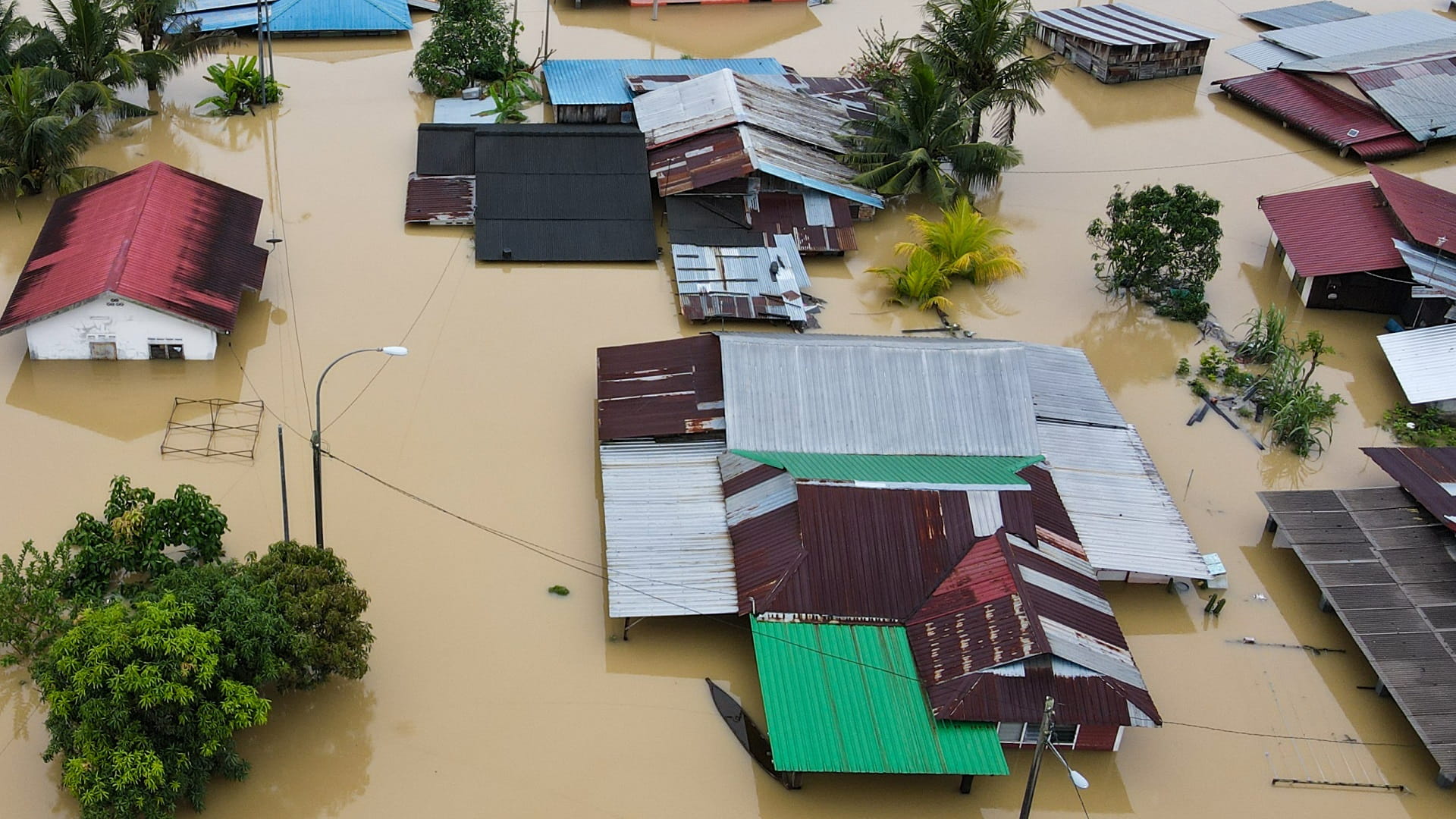 Image for the title: At least four dead, thousands evacuated in Malaysia floods 