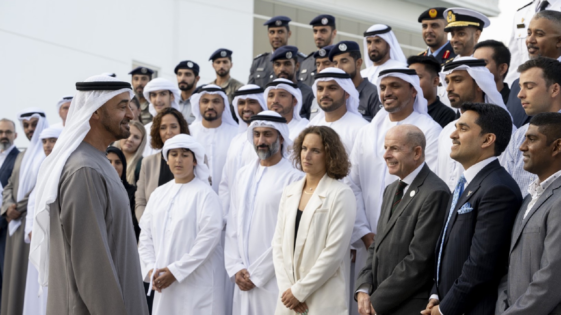 Image for the title: Mohamed bin Zayed receives UAE's Swimming Team 62 