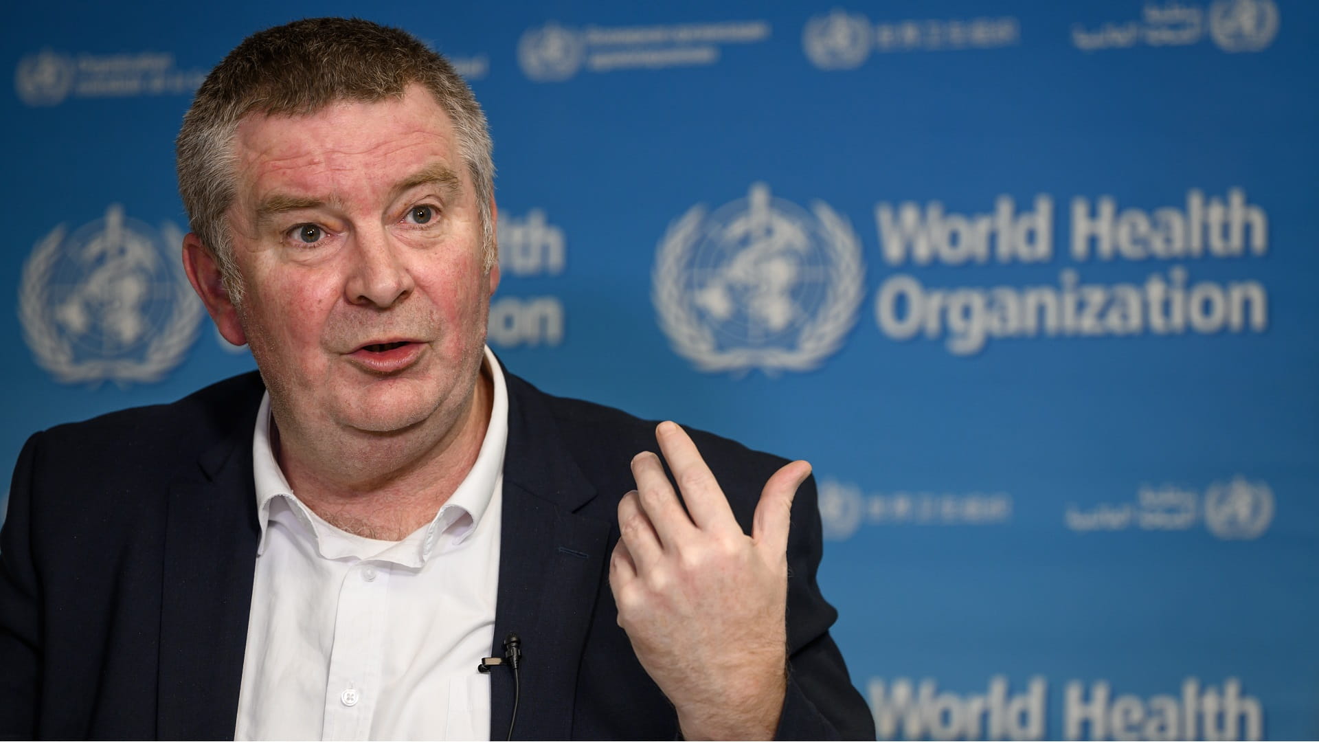 Image for the title: WHO sees Covid posing similar threat to flu this year 