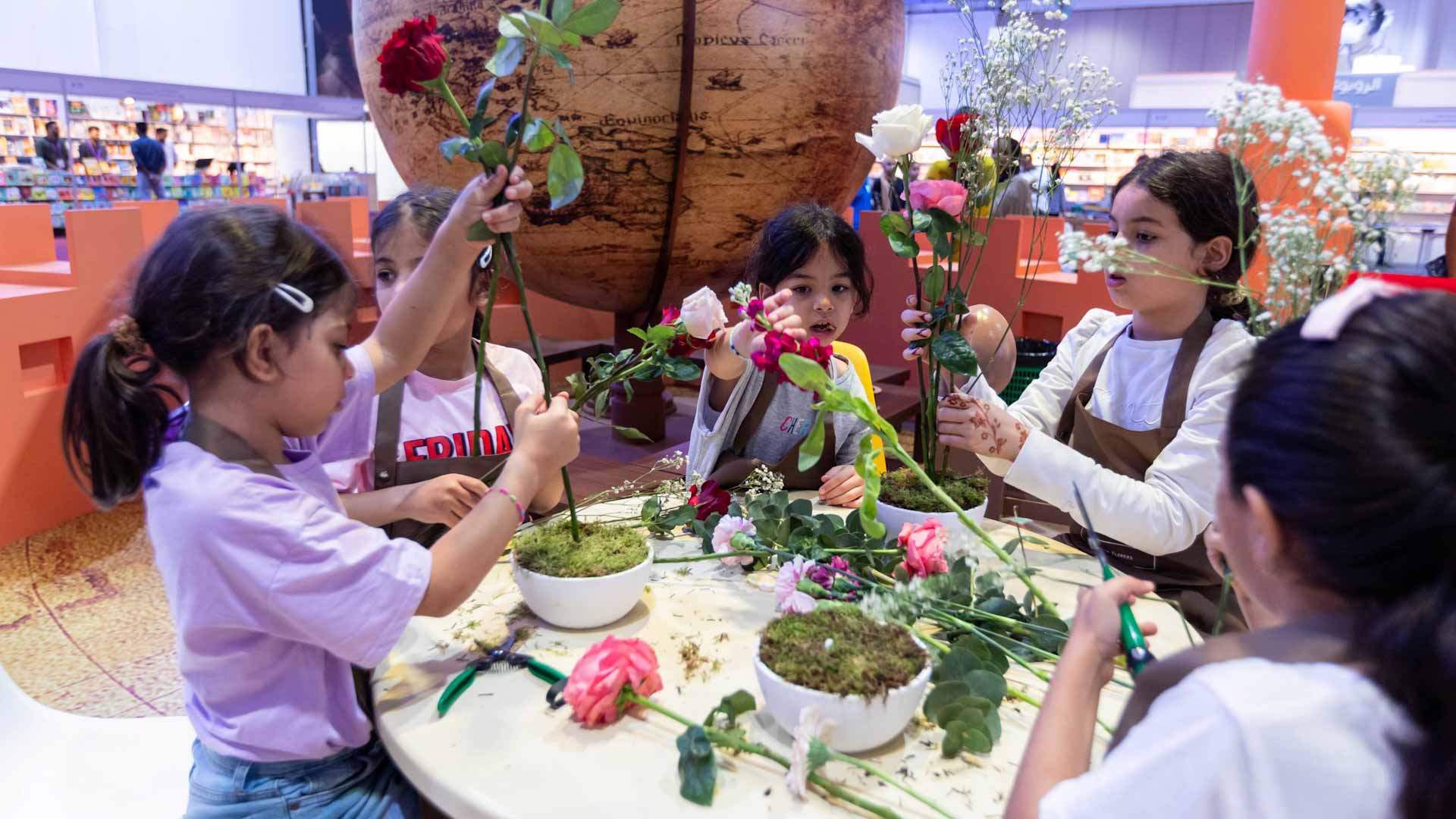 Image for the title: Children’s creativity blooms at flower arrangement workshop 