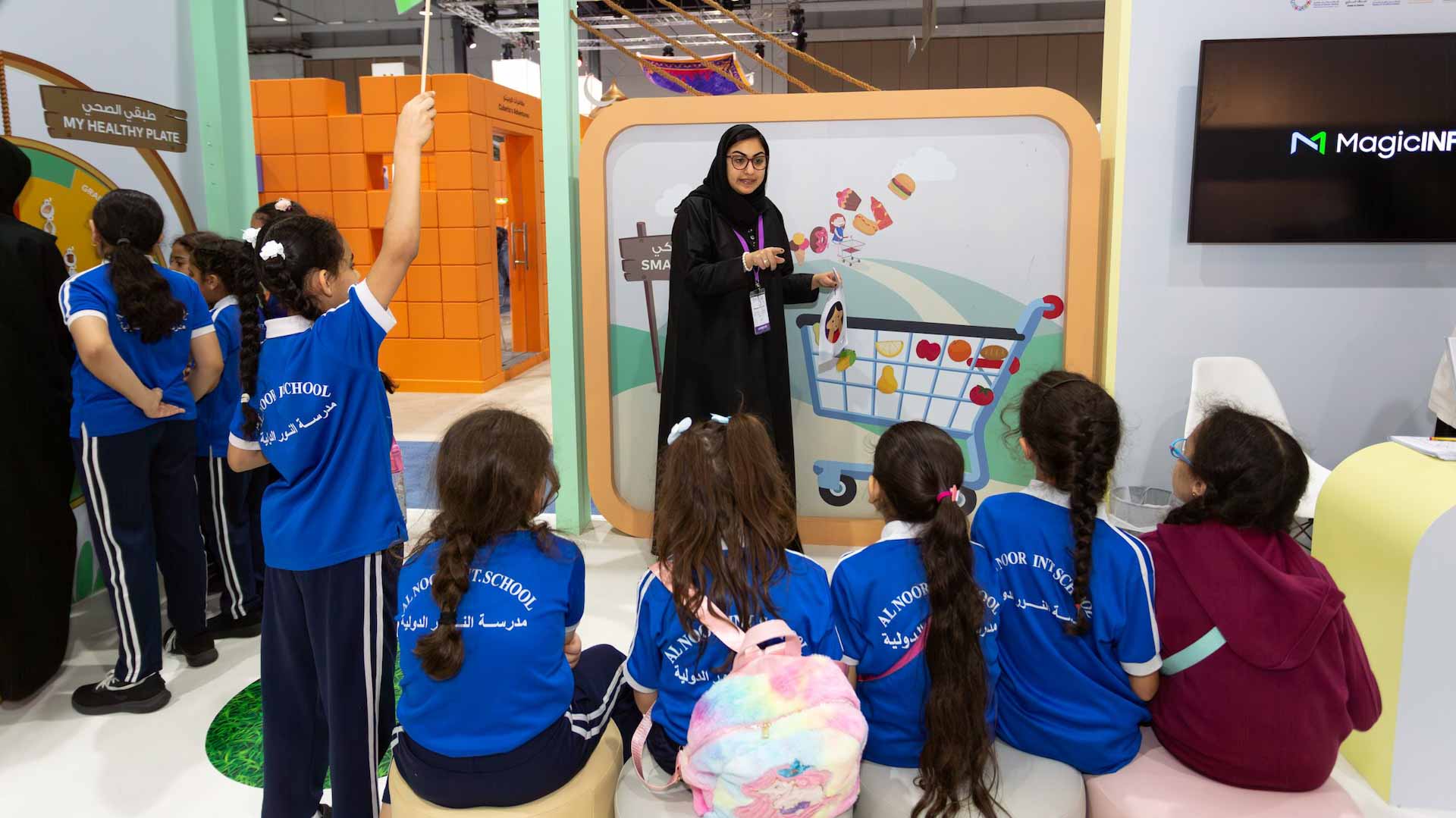 Image for the title: Young SCRF visitors taught how to detect cancer 