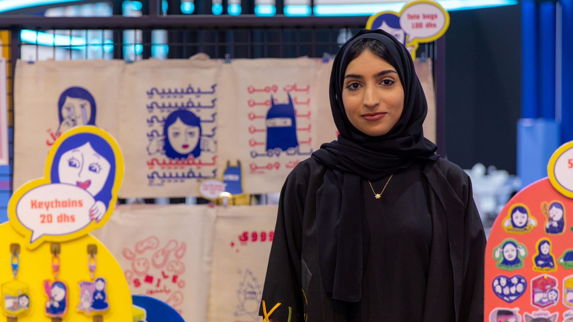 Image for the title: SCRF: Artist delights visitors with items featuring Emirati humour 