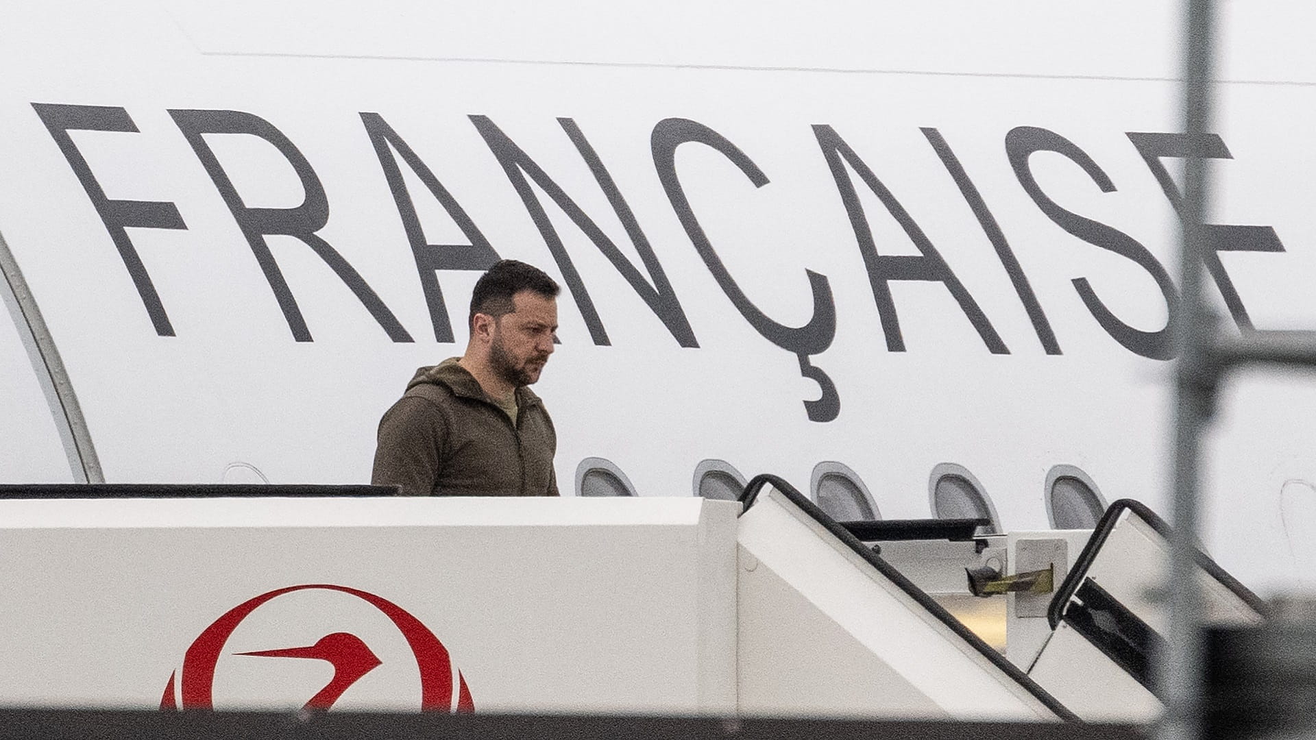 Image for the title: Zelensky arrives at G7 as Ukraine wins access to F-16s 