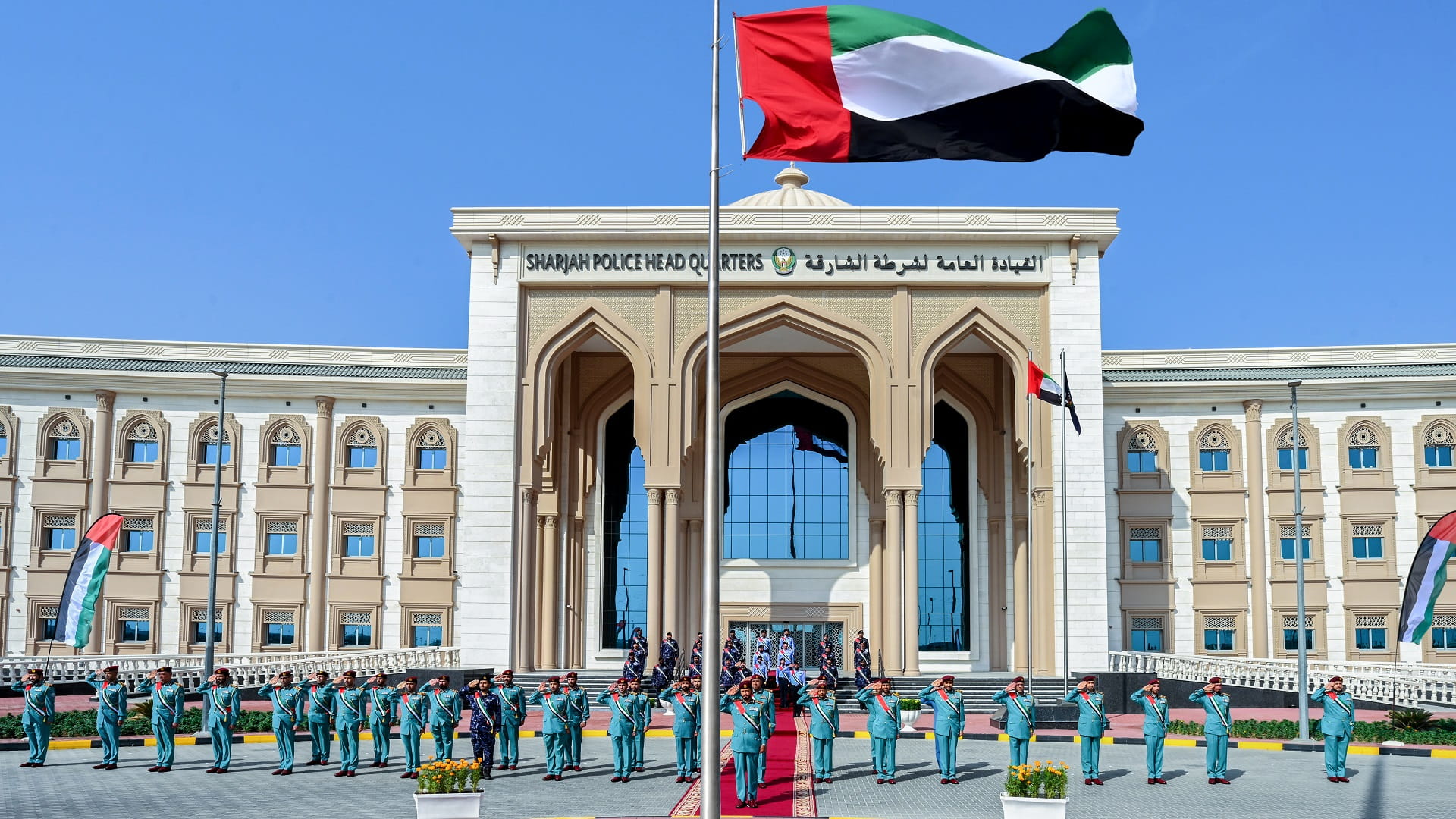 Image for the title: Sharjah Police Unfurl Flags of Celebration on Flag Day 
