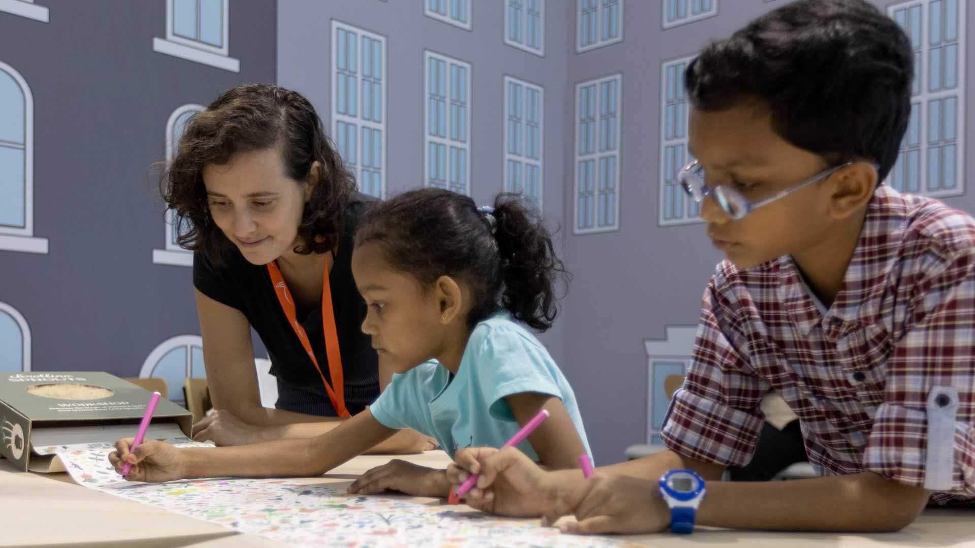 Image for the title: Young nature enthusiasts learn about sustainable designs at SIBF 