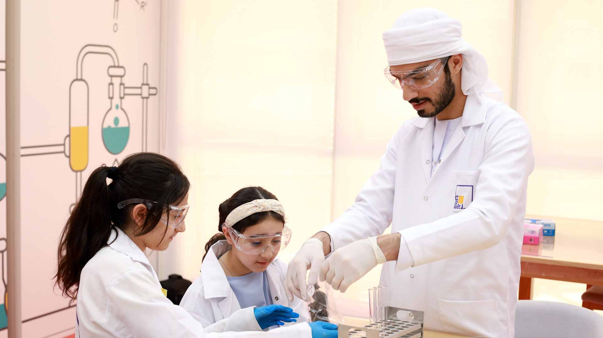 Image for the title: 676 members join Rubu Qarn's scientific experiments programme 